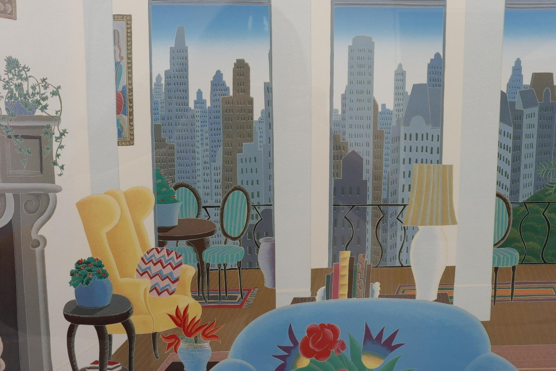 A silkscreen art print titled “Blue Couch” by listed artist Thomas McKnight. The scene depicts an apartment living room with a Manhattan skyscraper view. Set in a thin brown and wide beige double mat in a wooden taupe frame. Wired and ready to hang.