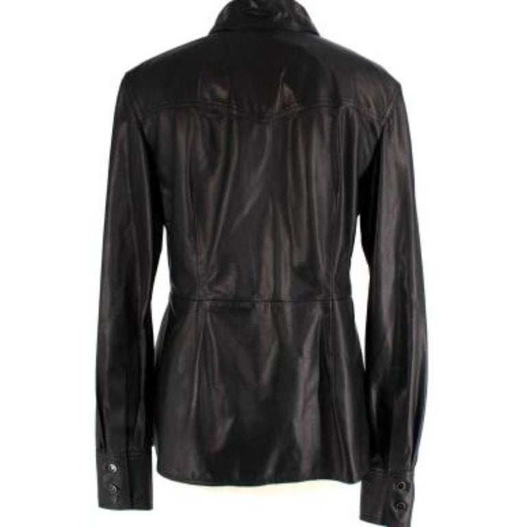 Tom Ford Silky Nappa Lambskin Leather Shirt
 
 -Super soft and lightweight nappa lambskin button down
 - Patch Pockets with TF buttons
 - Classic collar
 
 Made in Italy
 
 PLEASE NOTE, THESE ITEMS ARE PRE-OWNED AND MAY SHOW SIGNS OF BEING STORED