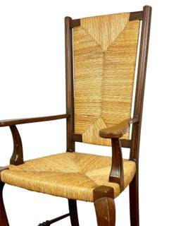 Sillón estilo Reina Ana realizado en cuerda de enea entretejida y madera de Haya