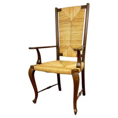 Sillón estilo Reina Ana realizado en cuerda de enea entretejida y madera de Haya