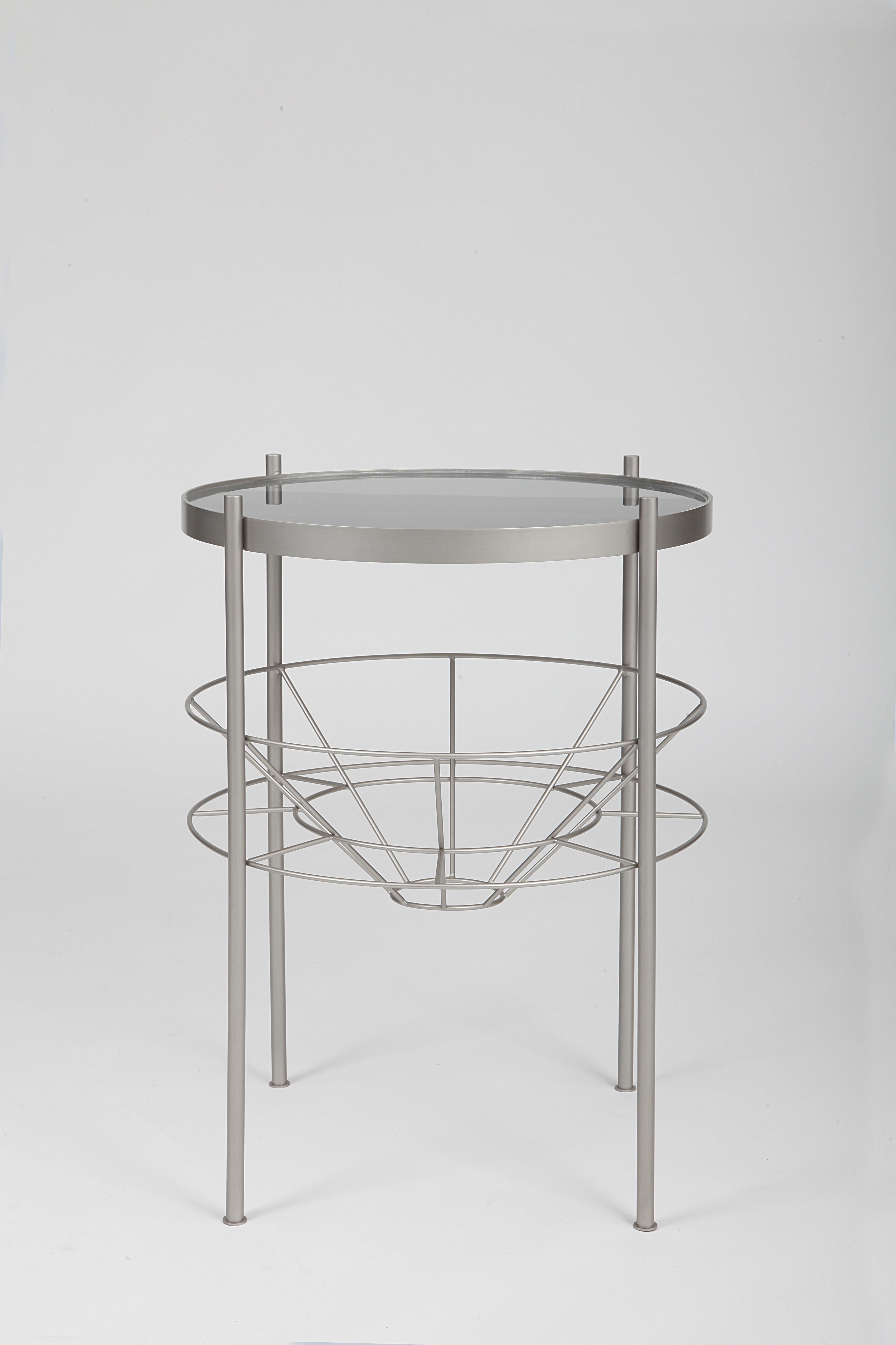 Silos Side Table by Dalmoto
Dimensions: Ø 54 x H 67 cm.
Materials: Nichel Marino nickel and resin.

Available in different metal and resin options. Available in two sizes. Please contact us. 

Silo and Olis are metal coffee tables with a resin top.