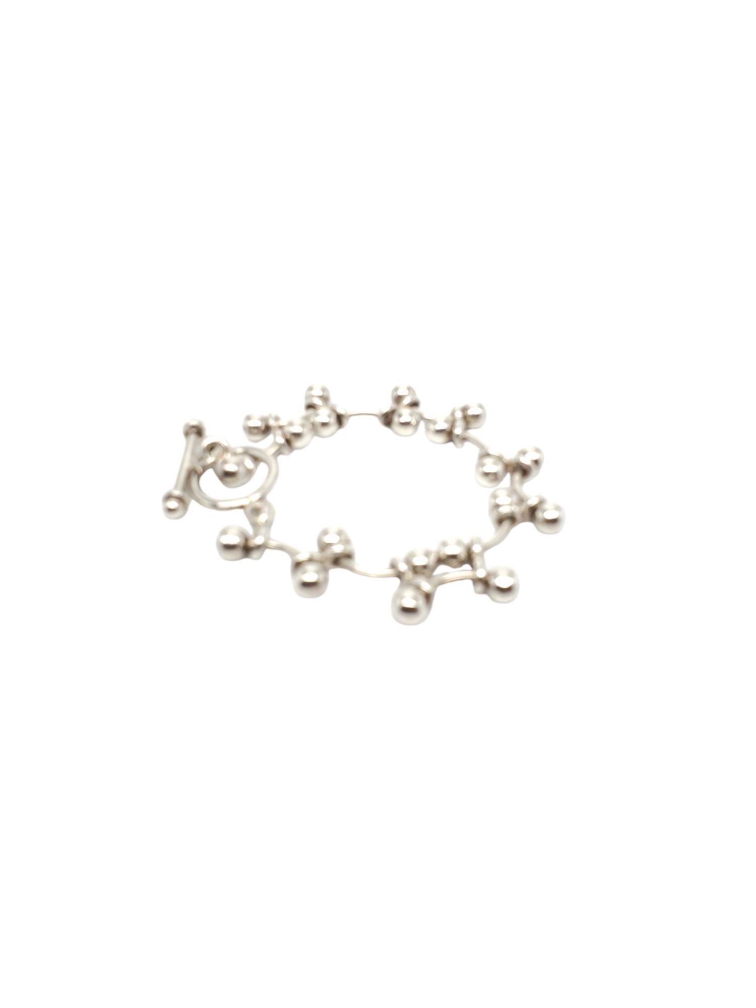 Perlina a barretta in argento sterling Silpada  Braccialetto A Link.

Questo braccialetto Silpada è realizzato in argento sterling con maglie a barre intrecciate.

Dimensioni: 8 pollici

Timbrato: SILPADA 925

Peso: 19,2 dwt / 29,9 gr.

Ottime