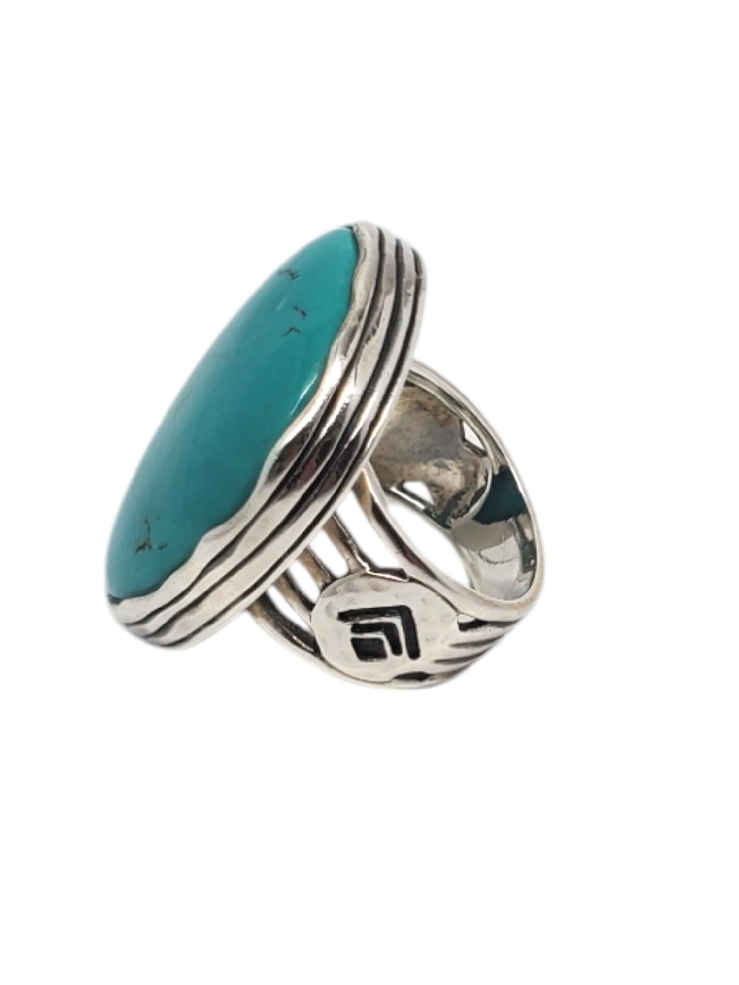 Silpada Sterling Silver Tumble Turquoise Ring -

This stunning Silpada ring features a beautiful tumble turquoise stone (30.50 mm x 21.54 mm) set in classic sterling silver.

Shank: 7.3 mm

Size: 7

Stamped: SILPADA 925 CHINA

Weigh: 10.6 dwt /