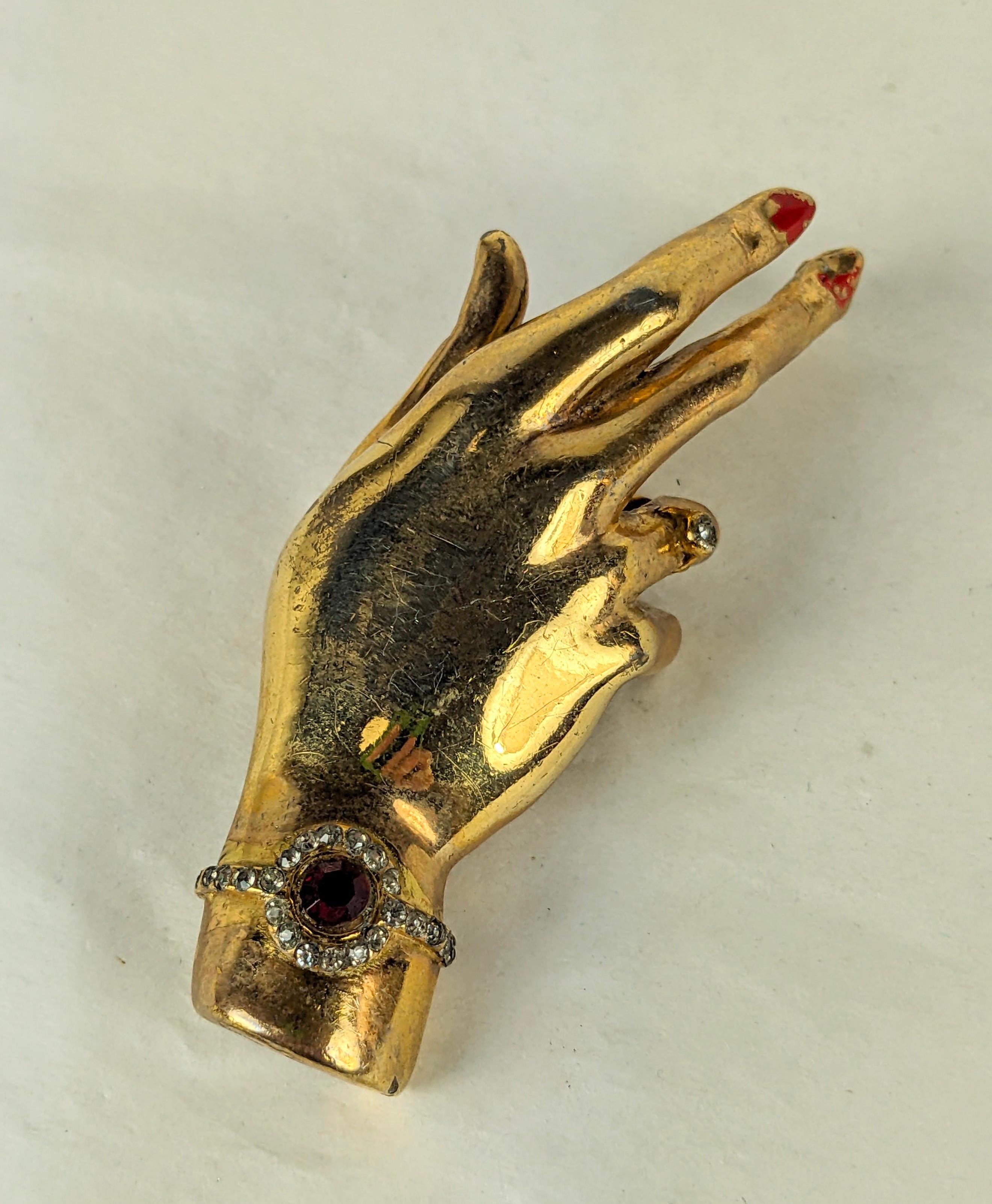 Amazing Rare Silson Art Deco Gilt Corsage Hand Brooch from the 1940's with a jeweled bracelet, enameled fingernails and engagement ring. Designed with a fitting inside to hold a spray of flowers on lapel.
 3