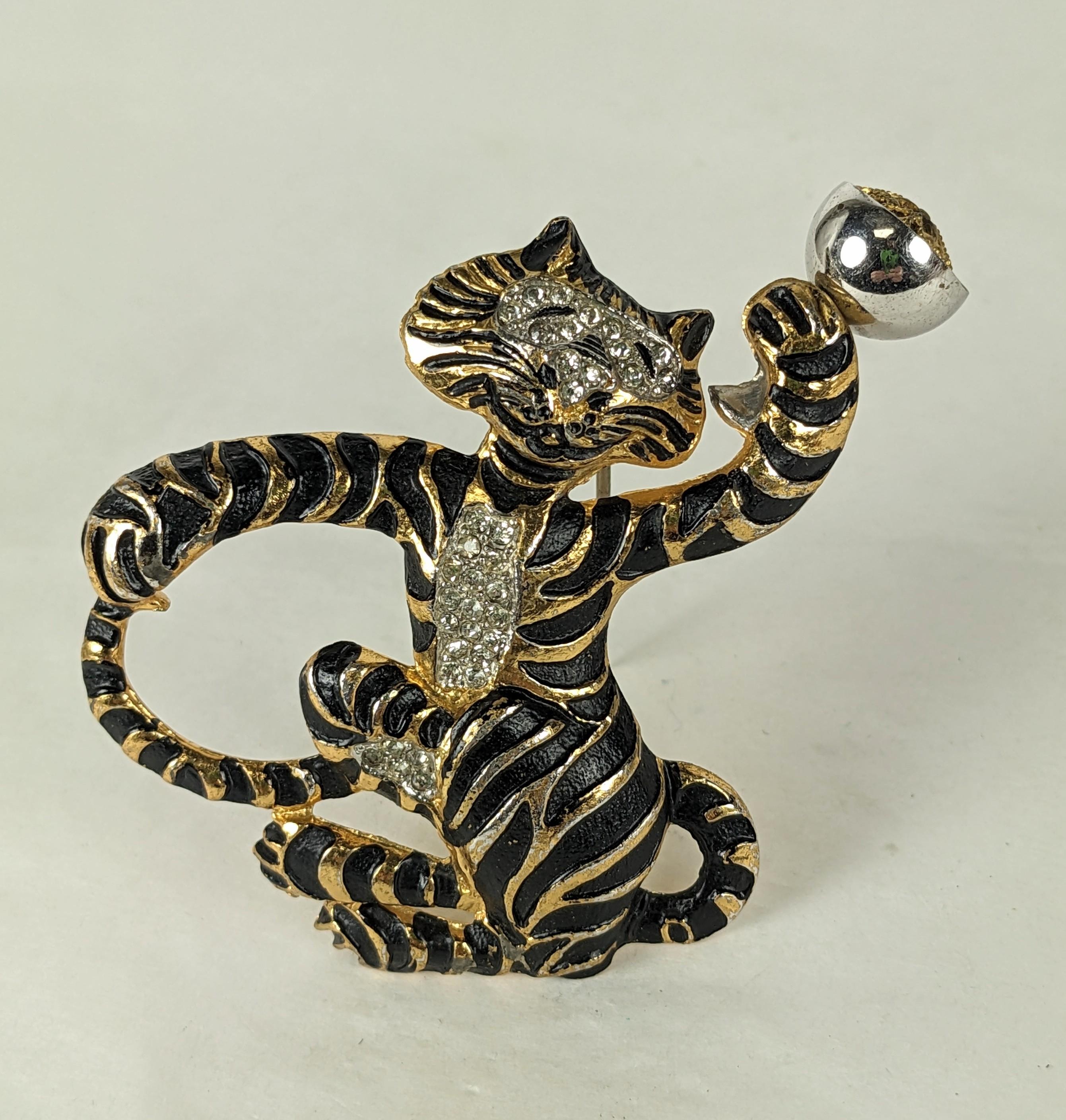 Charming Silson Festive Tiger Clip with Perfume cap in his martini glass. Cotton is inserted under filigree cap and scent is added after. 
1930's USA. 2.5
