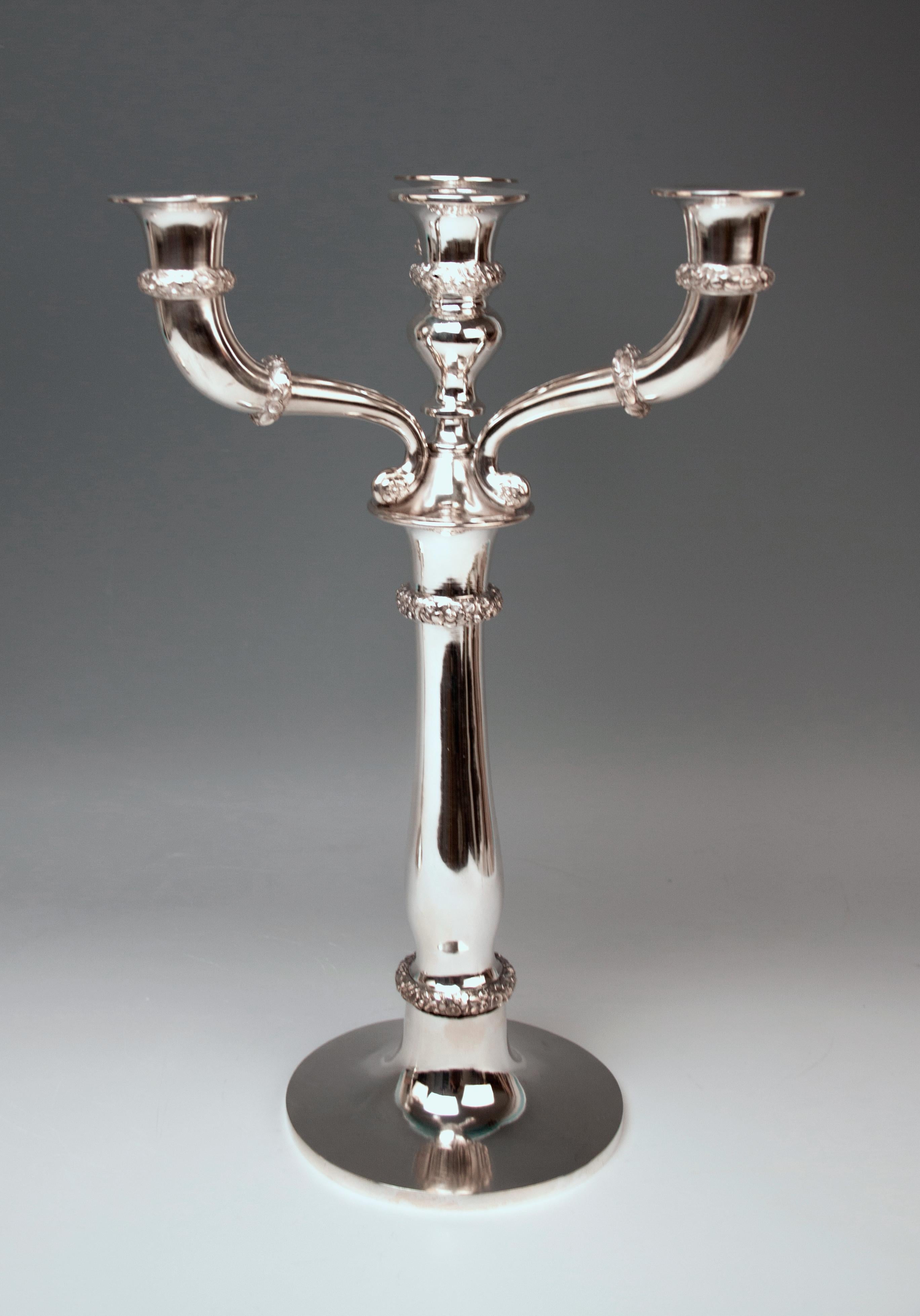 Austrian excellent Biedermeier silver pair of candlesticks / candelabras, made 1829.

Very interesting Viennese silver pair of candlesticks of finest manufacturing quality as well as of elegant appearance. These candlesticks were made during