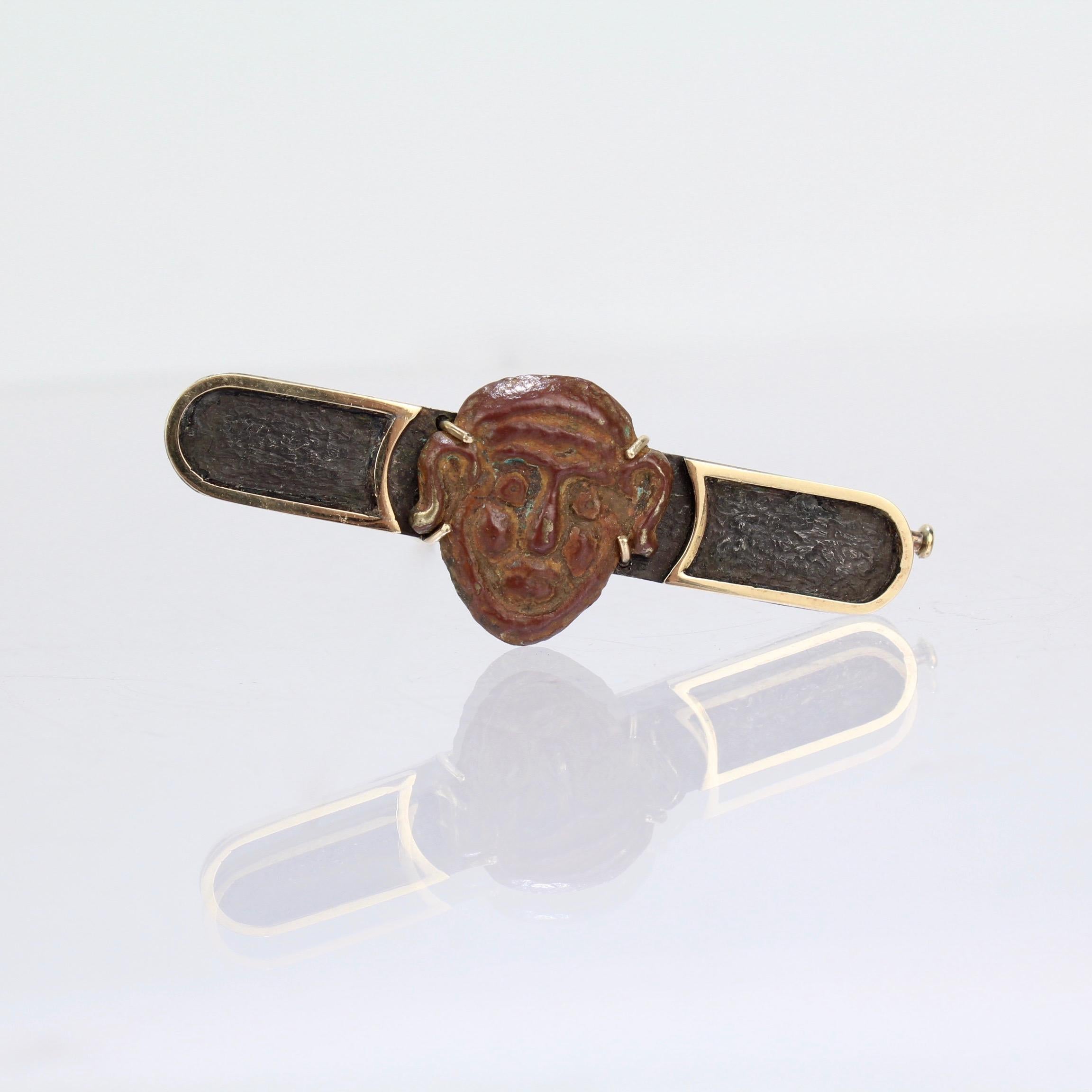 Artisan Silver and 14 Karat Gold Bar Pin with an Antique Japanese Bronze Mask, Paul Haig