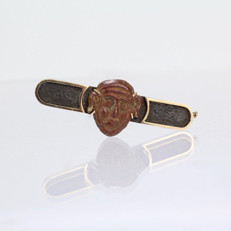 Silver and 14 Karat Gold Bar Pin with an Antique Japanese Bronze Mask