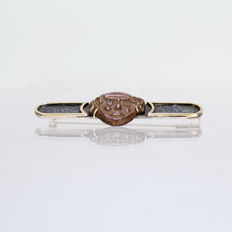 Silver and 14 Karat Gold Bar Pin with an Antique Japanese Bronze Mask