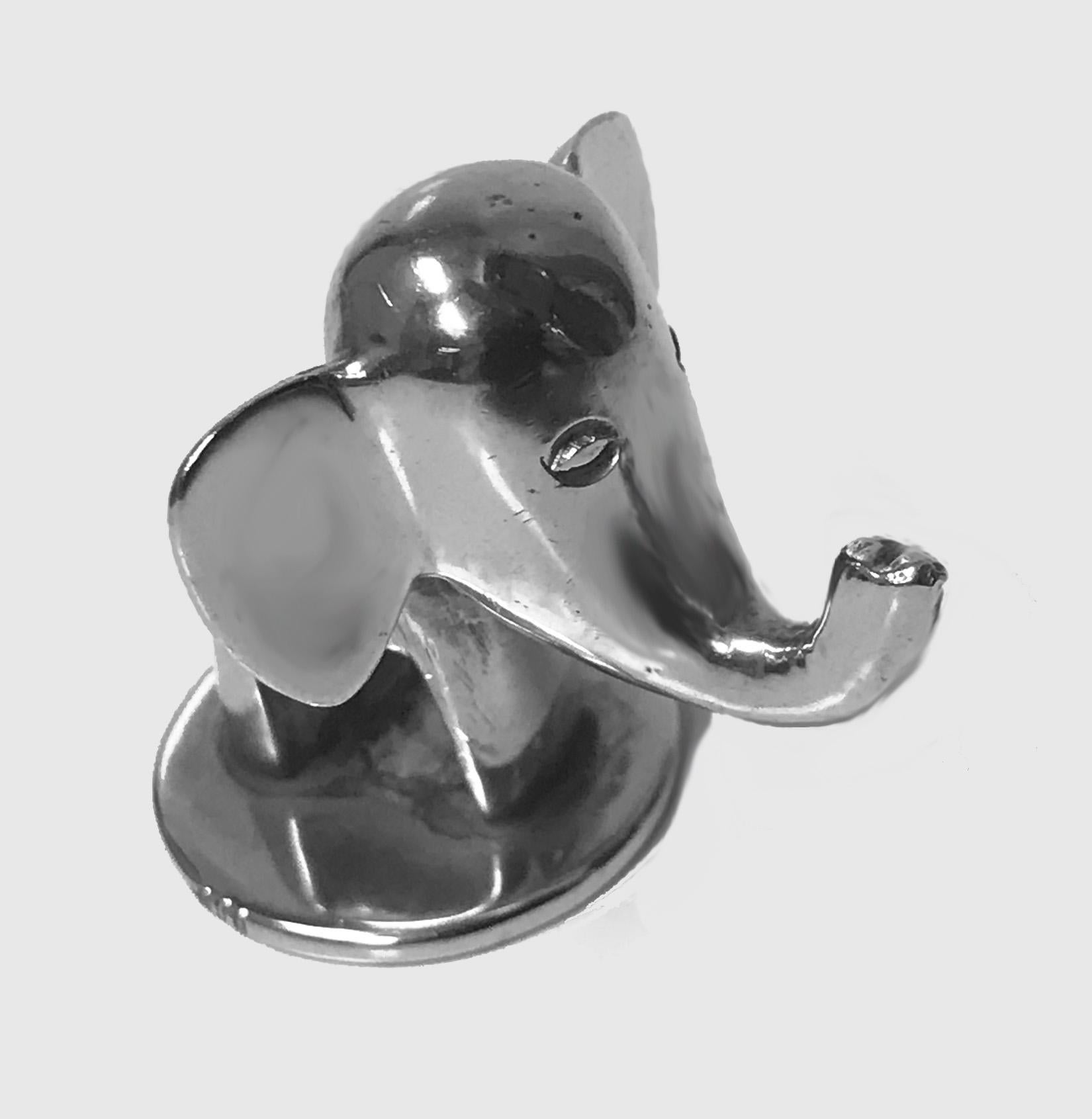 Silver 1950s Hagenauer style trumpeting Elephant. Stamped 900. Good solid example. Item weight: 58 grams. Measures: 1.5 x 1.5 inches.