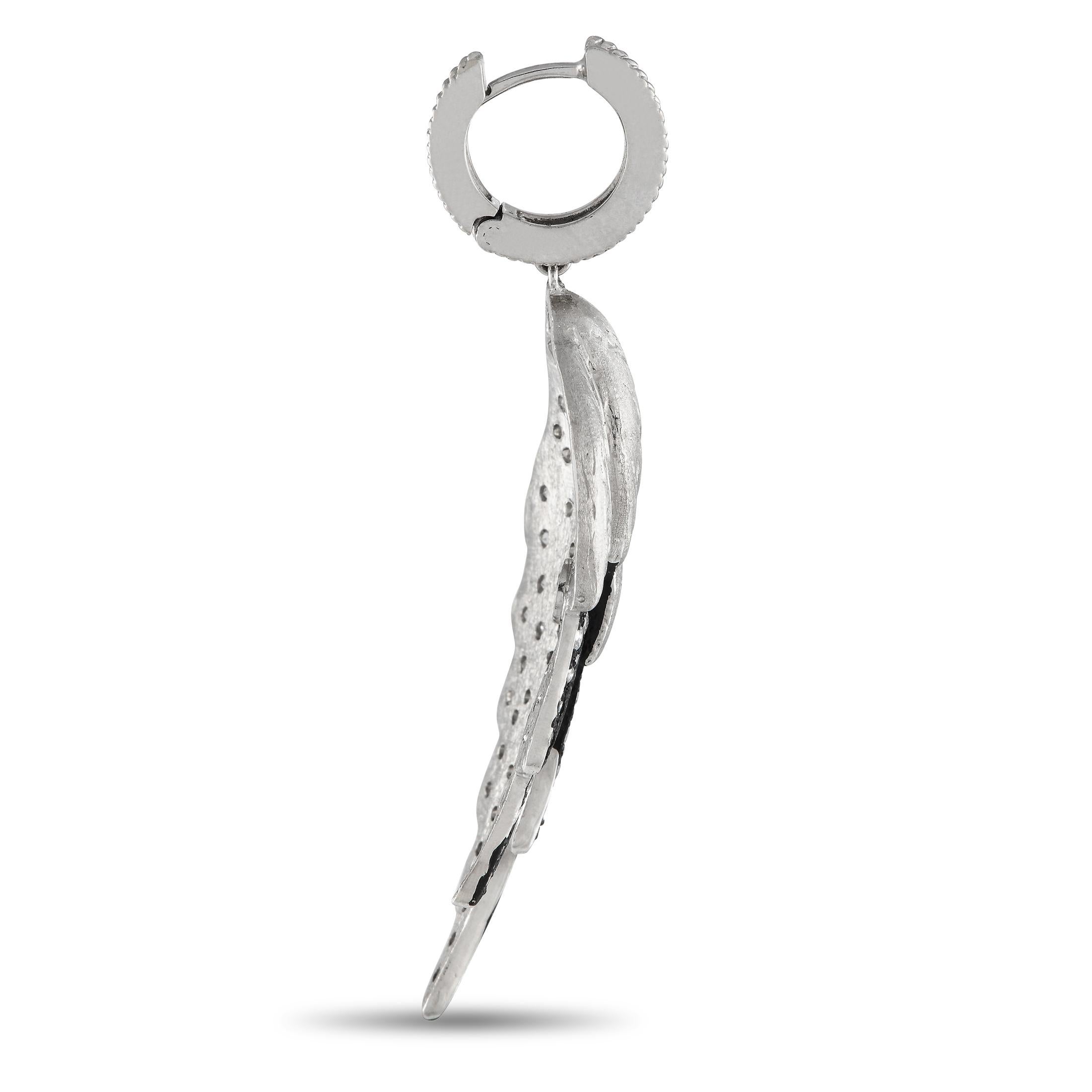 A delicate wing-shaped design makes these earrings simply unforgettable. Each one features a Silver setting that measures 2.0 long by 0.75 wide. Sparkling inset Diamonds with a total weight of 2.65 carats provide the perfect finishing touch.This