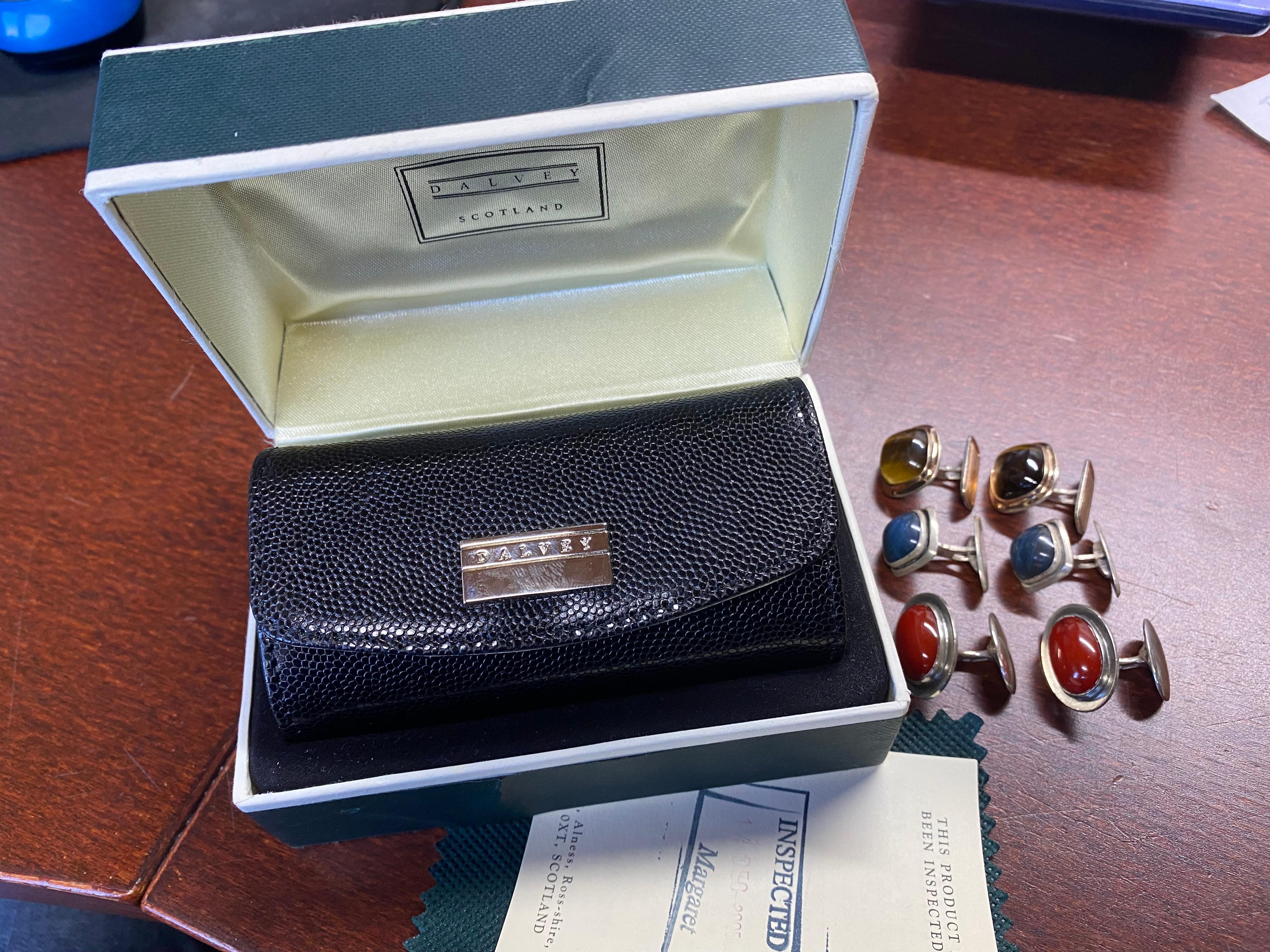 3 Pair of Silver Cufflinks Scandinavian Modern.
Cufflinks 1960s-1964s.
On the Red Stones Finland 1966.
Tiger eye 835? VG Sweden
and blues from Sweden? in them stamps O9? 1964?
All in silver.
No engravings.
Comes with unused  Leather Case.
Davely