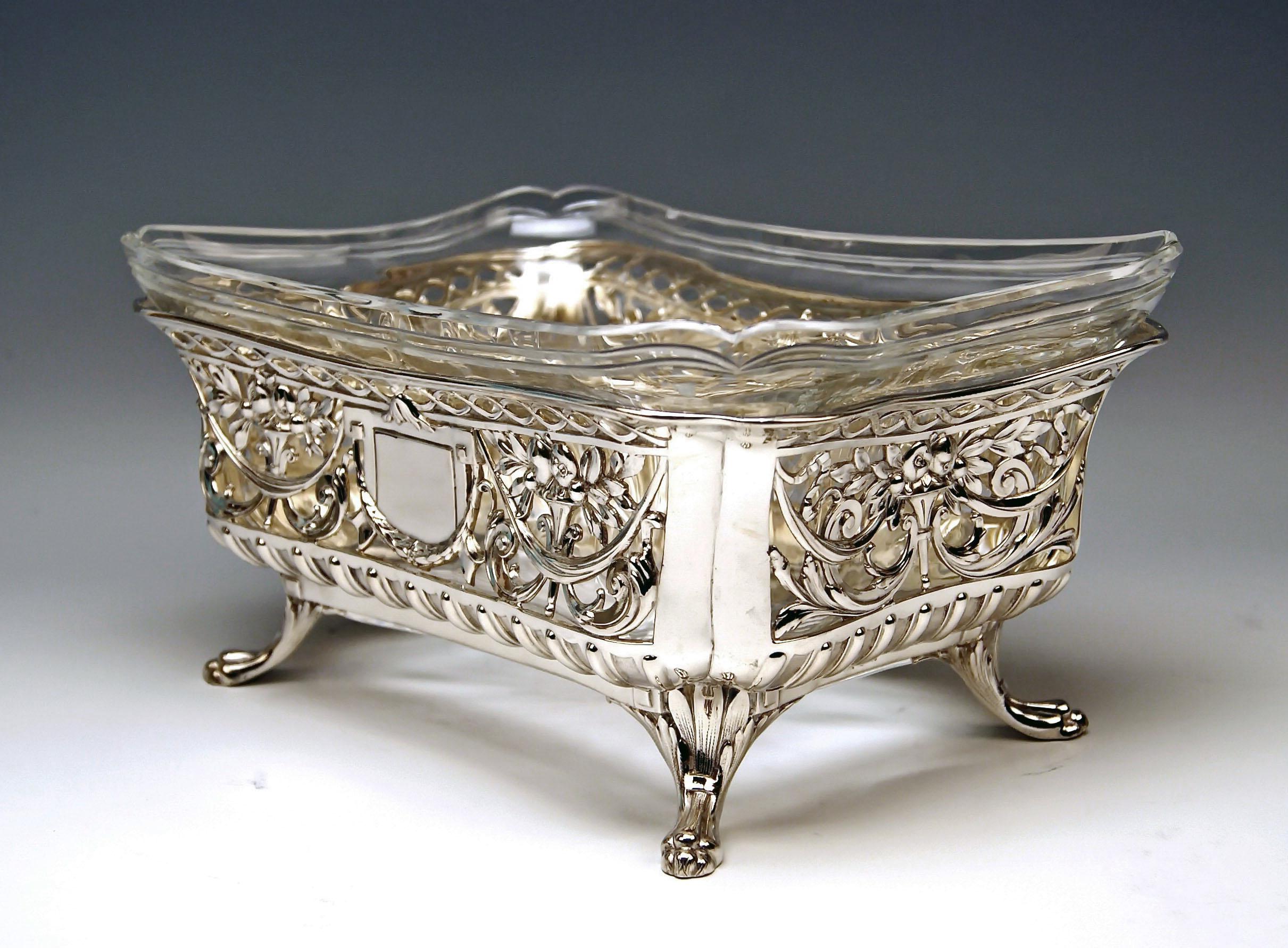 Silver nicest flower bowl / centrepiece with original gorgeous glass liner
Total width: 26.5 cm ( = 10.43 inches)

decorative style / transition to Art Nouveau 
made circa 1900

Hallmarked:
-- SILVER 800
-- branded by German Crescent with