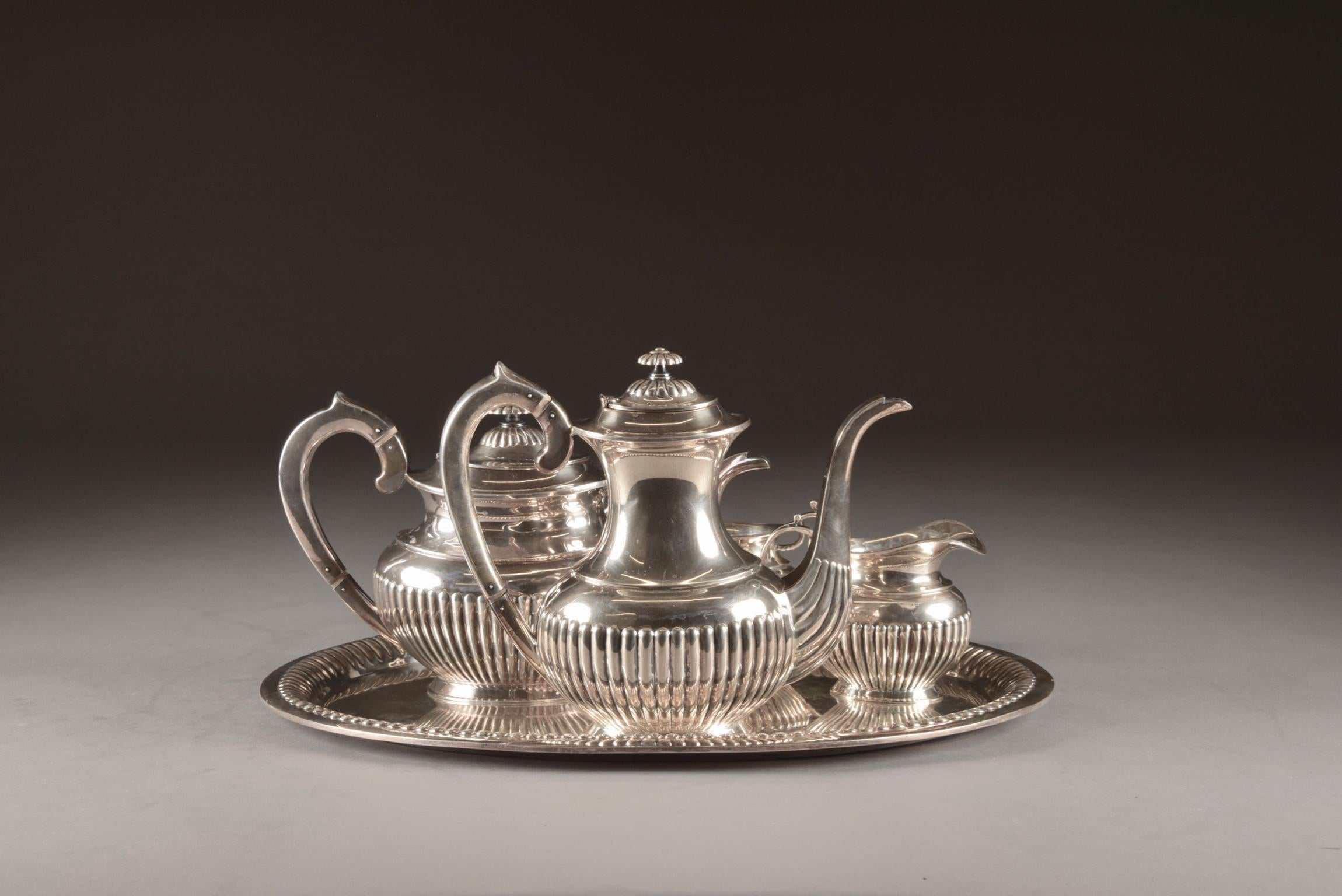 5 piece silver (835 /1000) coffee set by Dirk Aubert (The Hague, 2000). With hallmark DA+ and Z II, in very beautiful condition. 

Measures: Coffeepot: 26 x 21 x 11 cm 
Teapot: 29 x 17 x 12 cm 
Sugar pot: 17 x 10 x 9 cm 
Creamer: 12 x 9 x 7