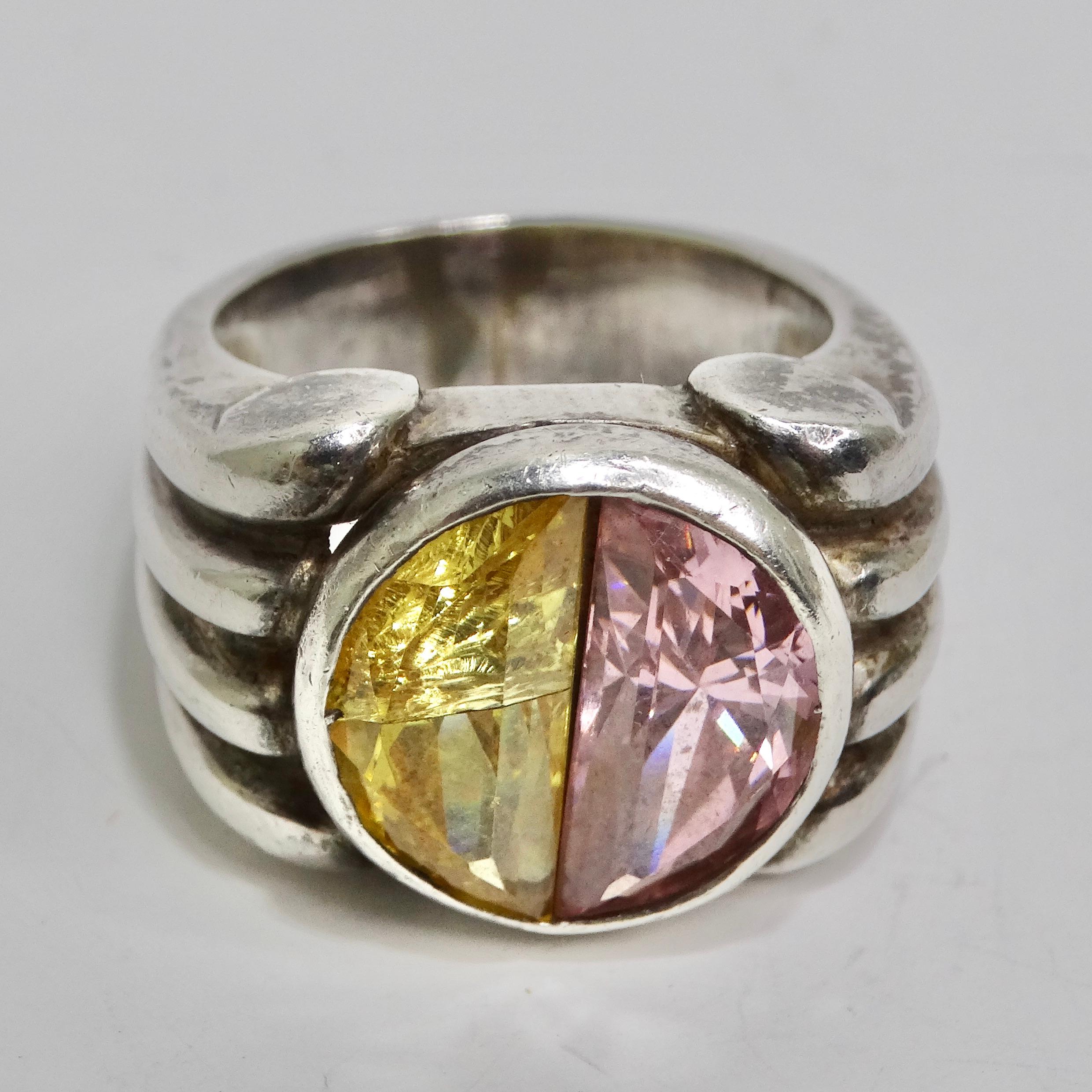 Introducing our exquisite Silver 925 Pink and Yellow Quartz Ring from the 1960s, a stunning vintage piece that captures the essence of a bygone era. Crafted with precision and adorned with a vibrant center quartz stone, this engraved ring is a