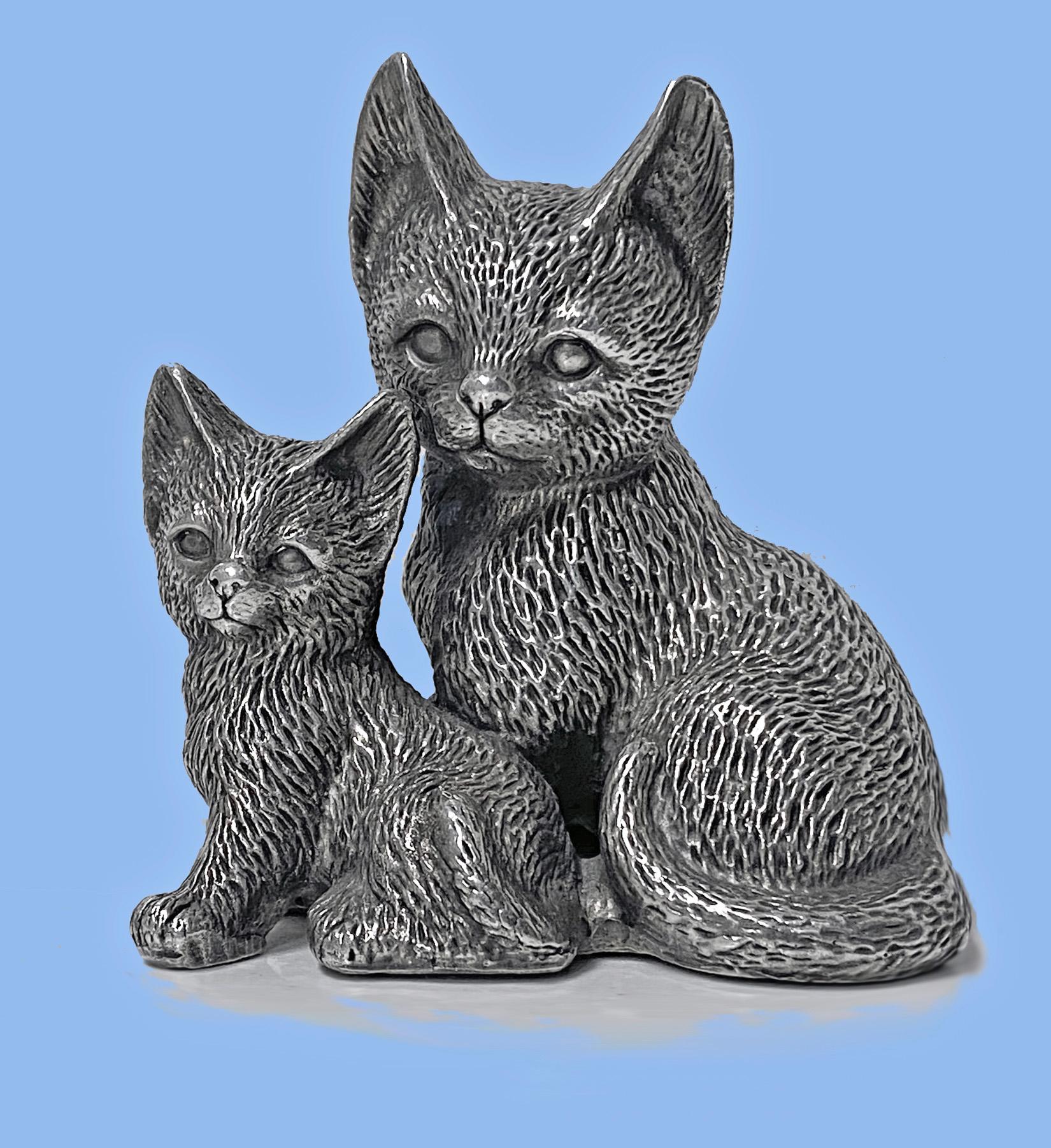 Silver 925 seated Cat and Kitten sculpture 1960’s. Realistically modelled seated cat and kitten, stamped underside Tekform 925 Silver pt. Measures: 3.50 x 4.00 x 3.625 inches. Item Weight: 283 grams. Resin filled interior.