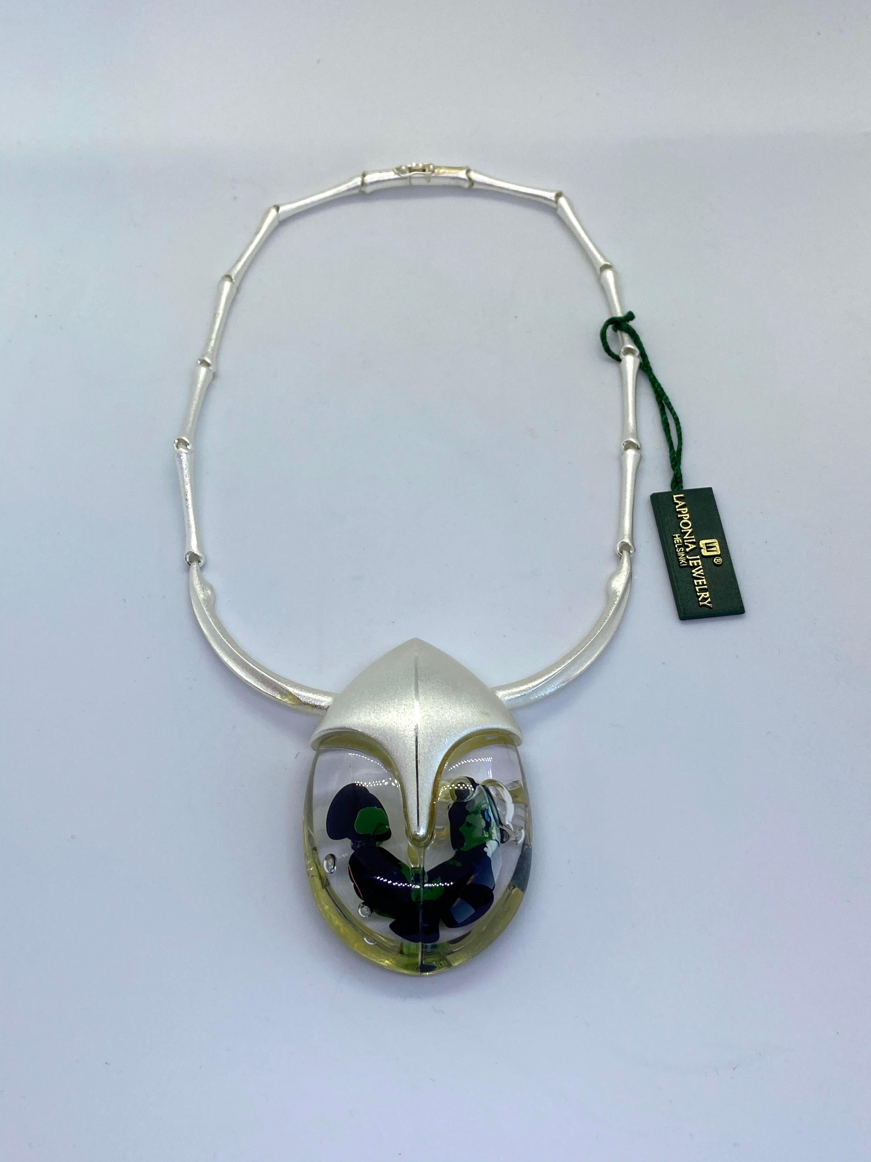 Silver Finland Björn Weckström Lapponia Scarabeo Necklace
Helsinki Finland 2001
Unused, old stock
In original bag

The most distinct period of material bound design in Bjorn Weckstrom's production,are the series of 25 sculptures in acrylic resin,