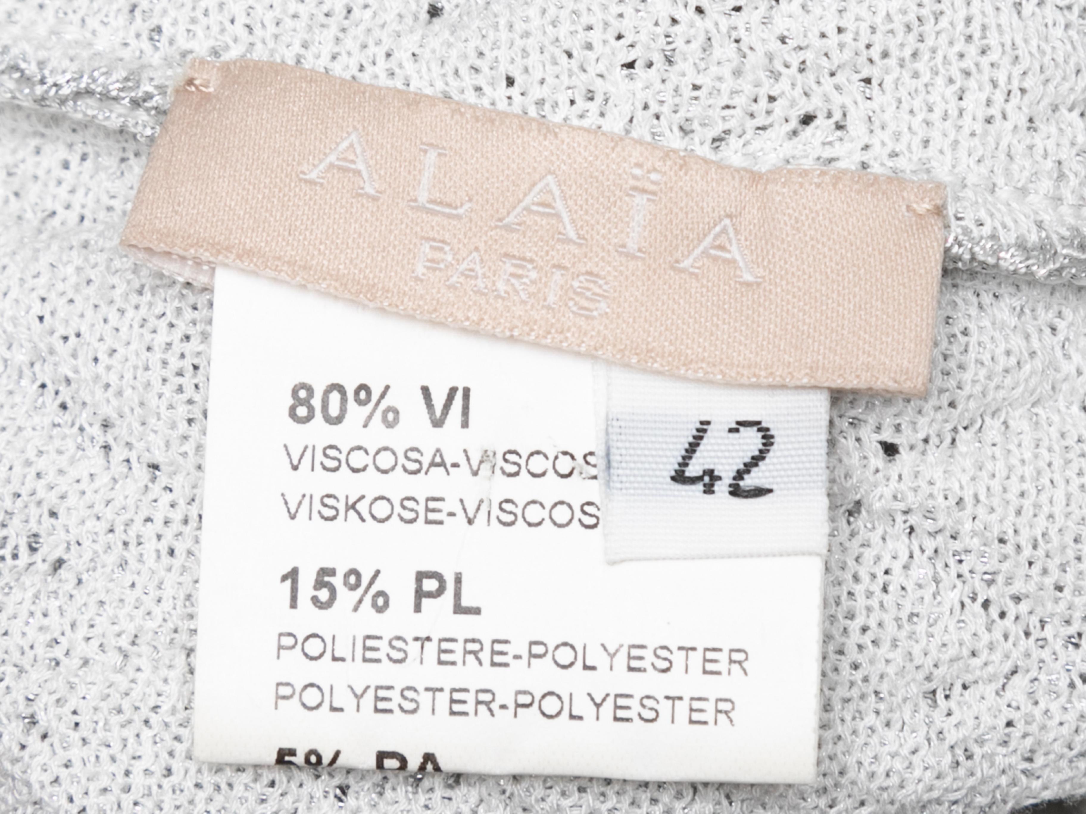Silver knit sleeveless bodycon dress by Alaia. Scoop neckline. 26