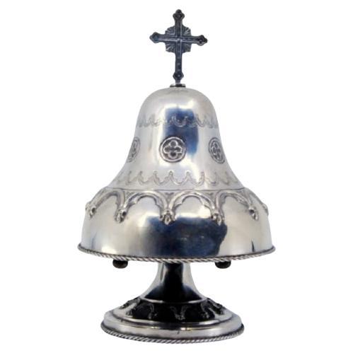 Silver altar bell w/ bows, cords 
topped w/ a radiant cross, mechanism inside