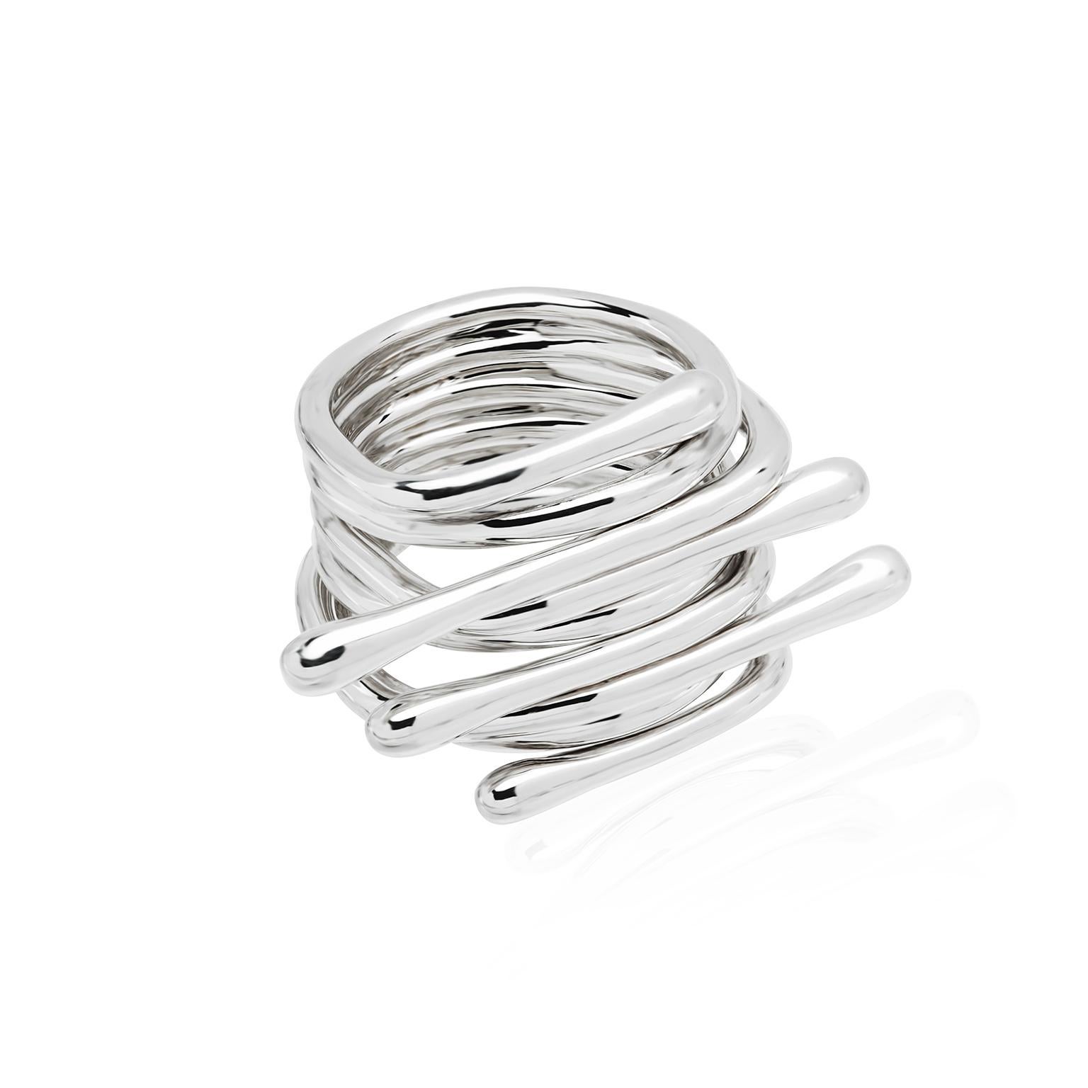 A tribute to Nature's breathtaking perfection may be seen in this stunning sterling silver ring made with different circular shapes in succession. Handmade by TANE's expert artisans in Mexico.

TANE, established in Mexico City in 1942, is a true