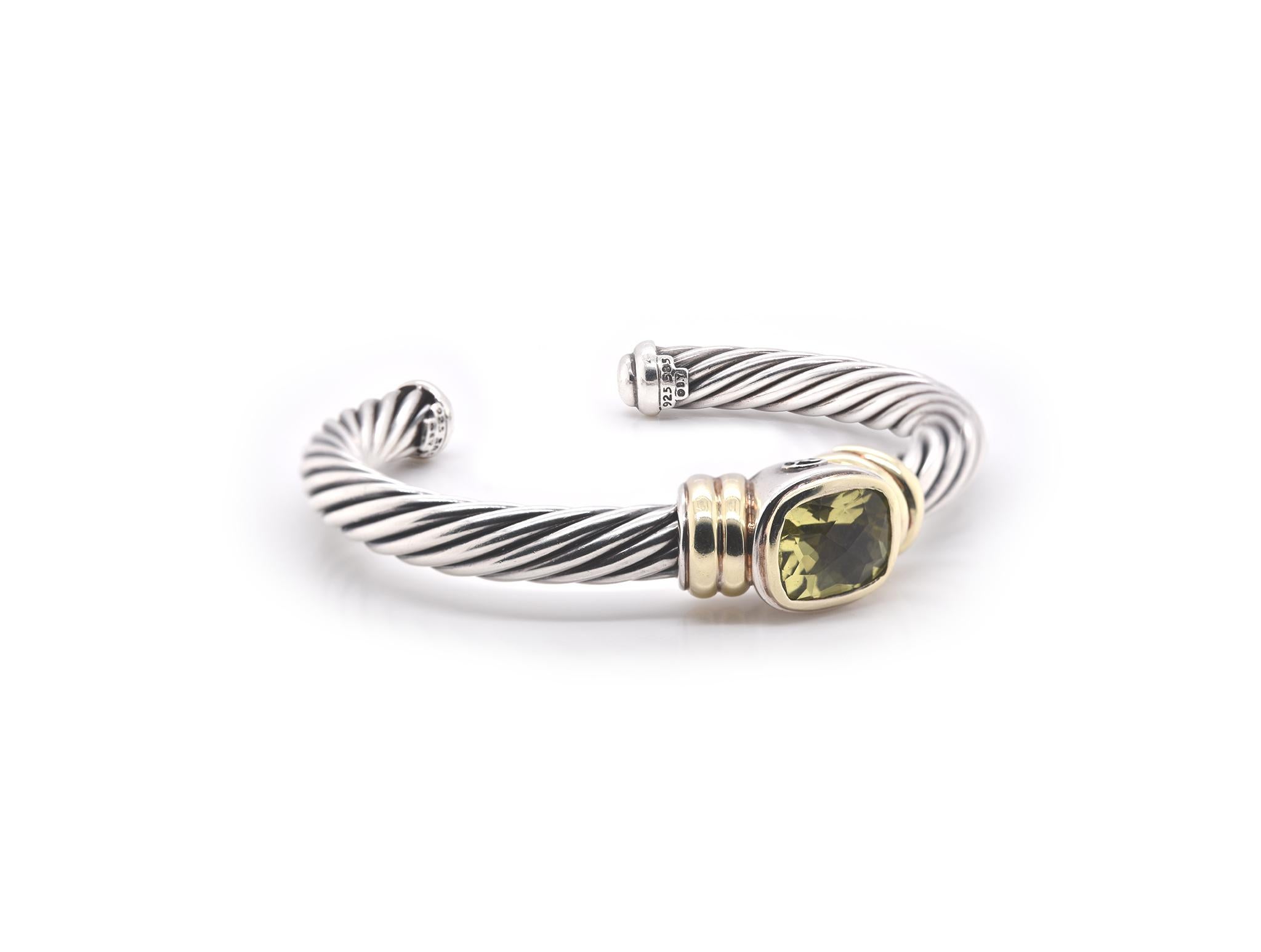 Designer: David Yurman
Material: 14k yellow gold and Sterling silver
Gemstone: Peridot
Dimensions: bracelet measures 7.25mm in width
Size: 6.5-inch wrist 
Weight: 46.14 grams
