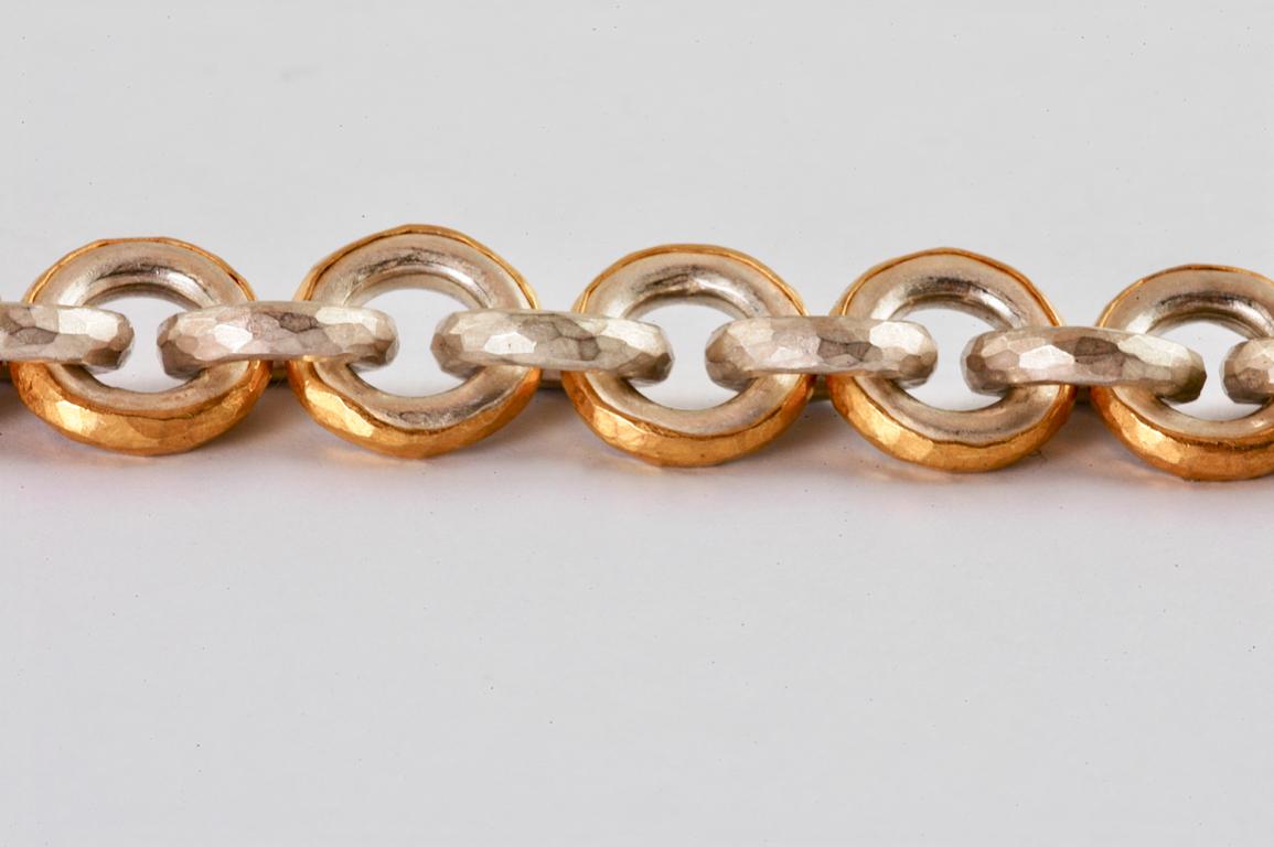 Round Cut Silver and 22 Karat Gold Multi Shape Link Bracelet