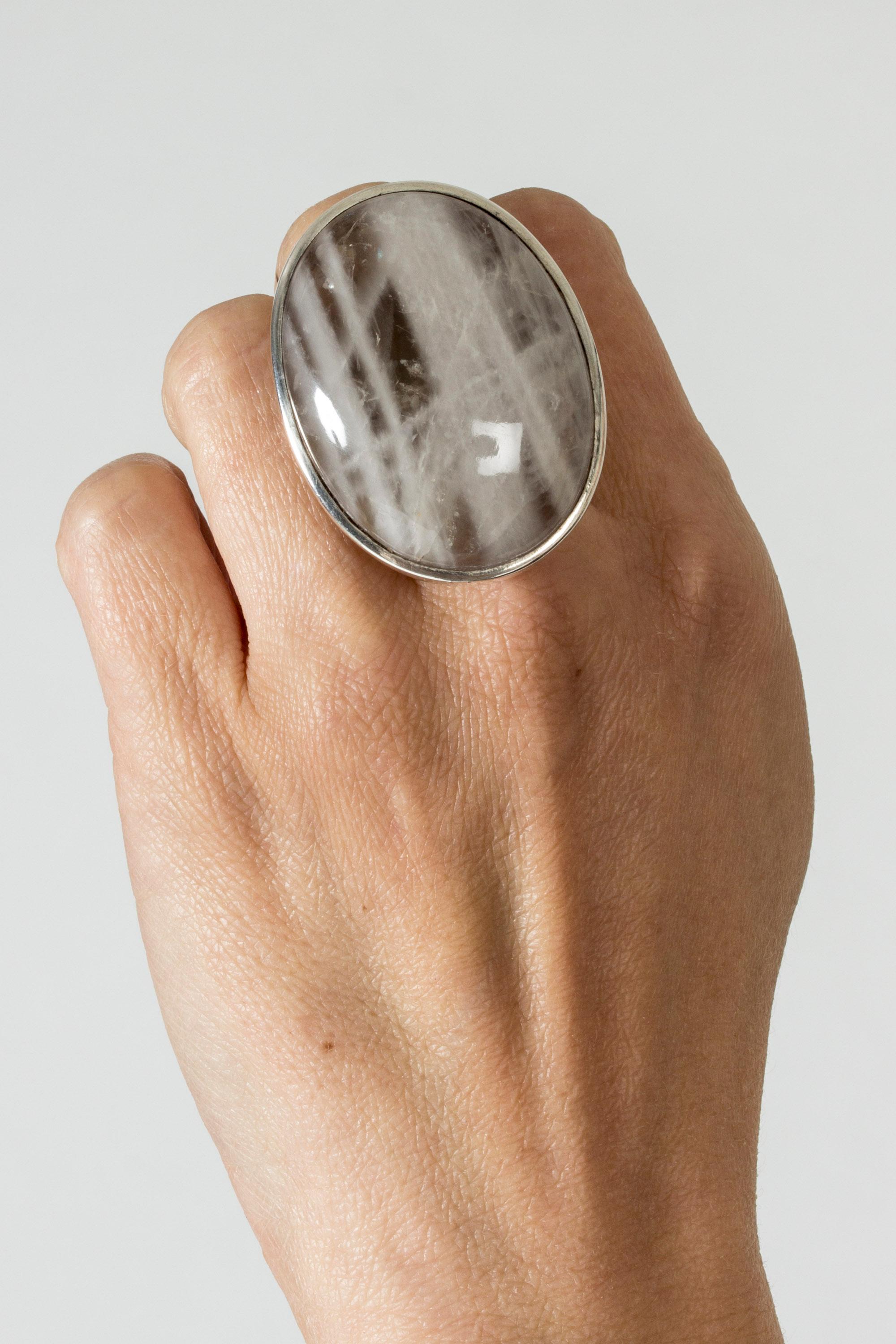 Amazing, oversized silver ring from Kaunis Koru, with a large grey agate stone. Imposing yet clean design with crisp silver elegantly framing the oval stone. Weighty feel.