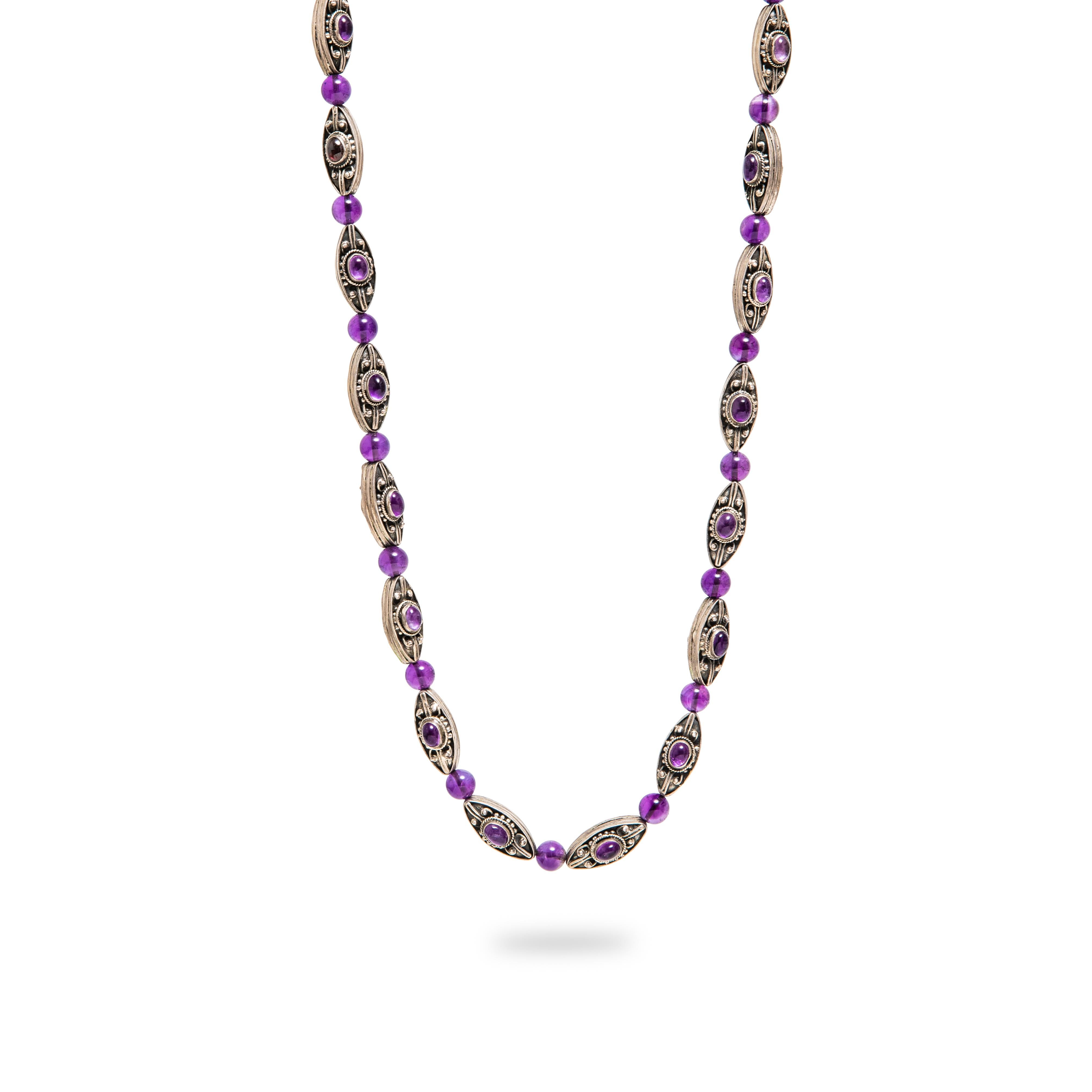 Offered is a Georg Jensen Style Silver and Amethyst Oval Cabochon and Beads Necklace. the necklace measures 30