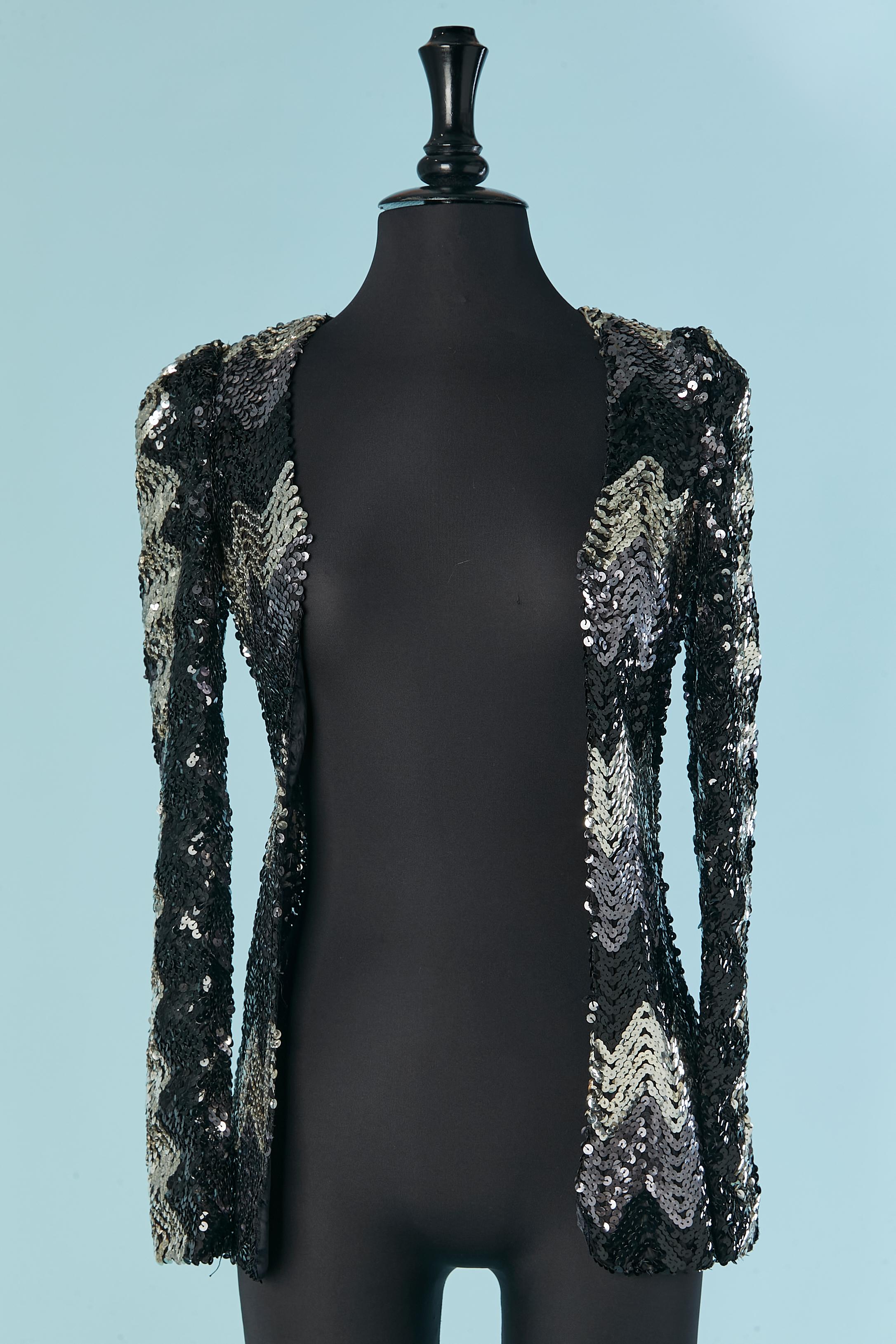 Silver and black sequin jacket. 
SIZE XS 