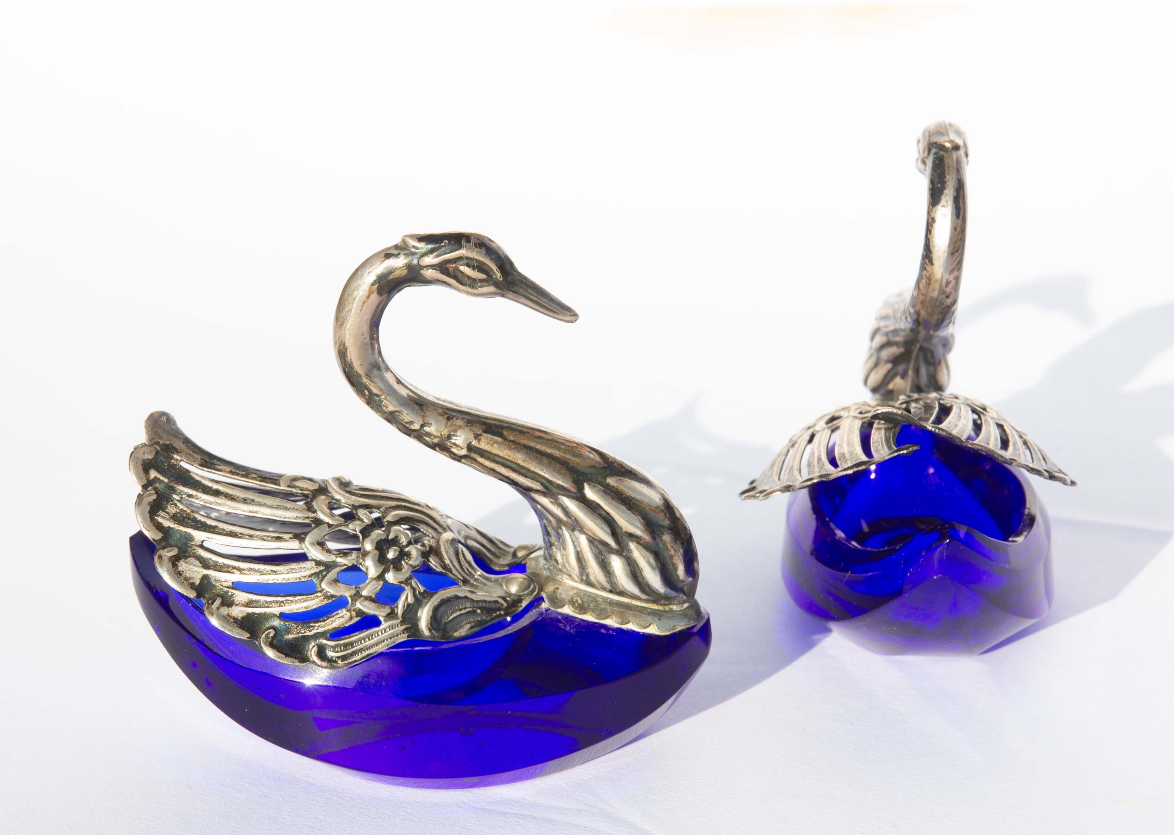 Pair of silver and cobalt blue glass salts. Good quality ground and polished crystal glass. Wings are adjustable, mid-20th century.