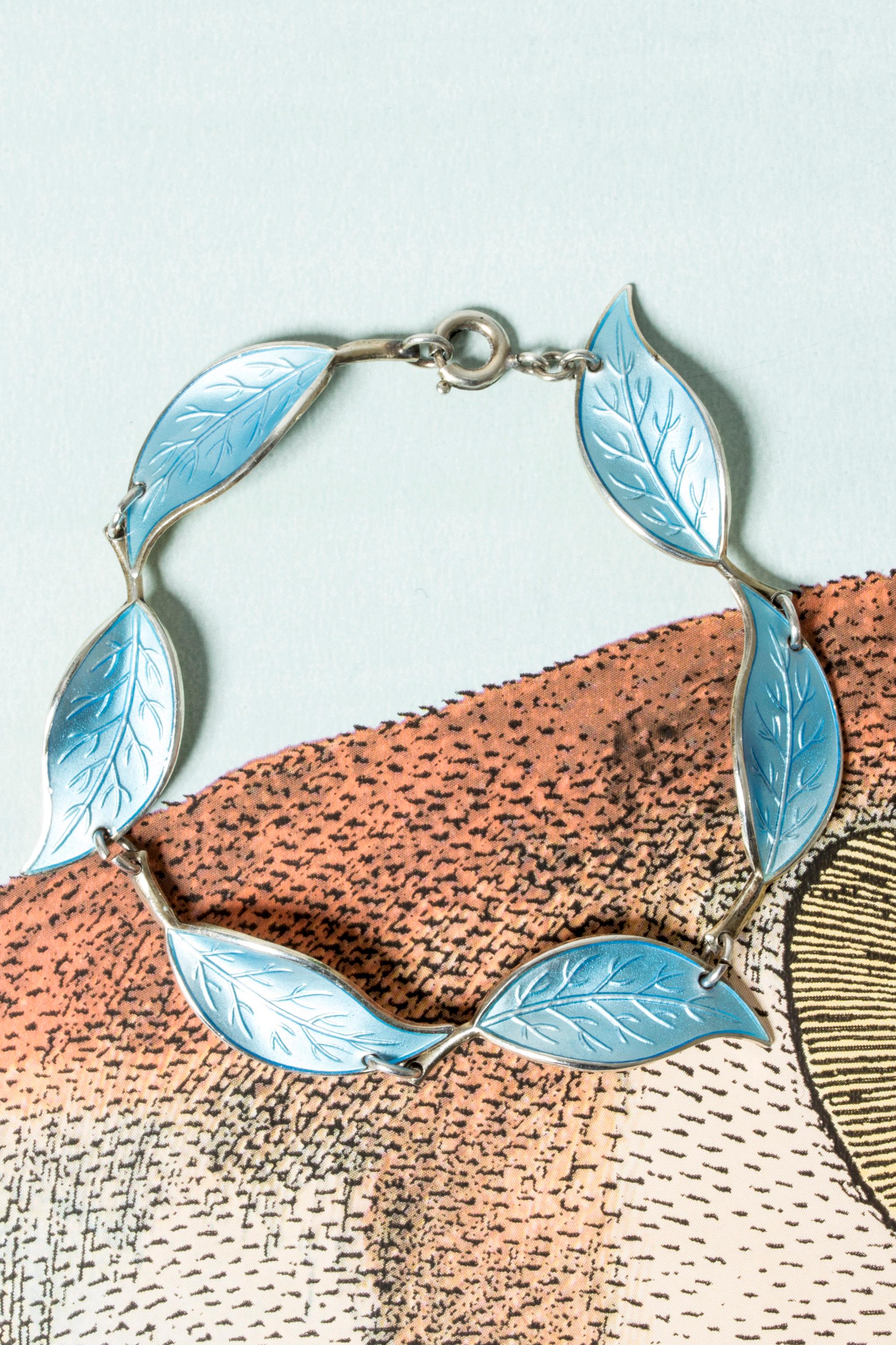 Elegant silver bracelet from David Andersen, in a sweet design of leaves with sky blue enamel. Nice dynamic look in the leaves and attention to detail. Light and easy to wear.