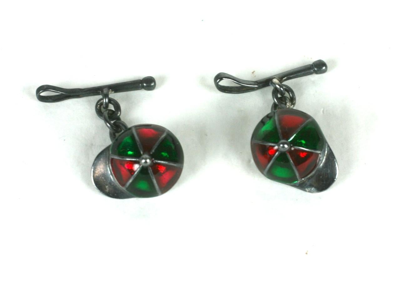 Sterling silver and Enamel Jockey Cufflinks with lovely ruby and green transparent enamel. English hallmarks. Circa 1980's.
Superb quality. Excellent condition. 
Width Cap 5/8