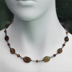 Silver and Floral Etched Amber Bead Necklace circa 1970s