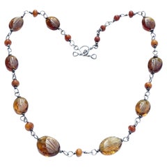 Silver and Floral Etched Amber Bead Necklace circa 1970s