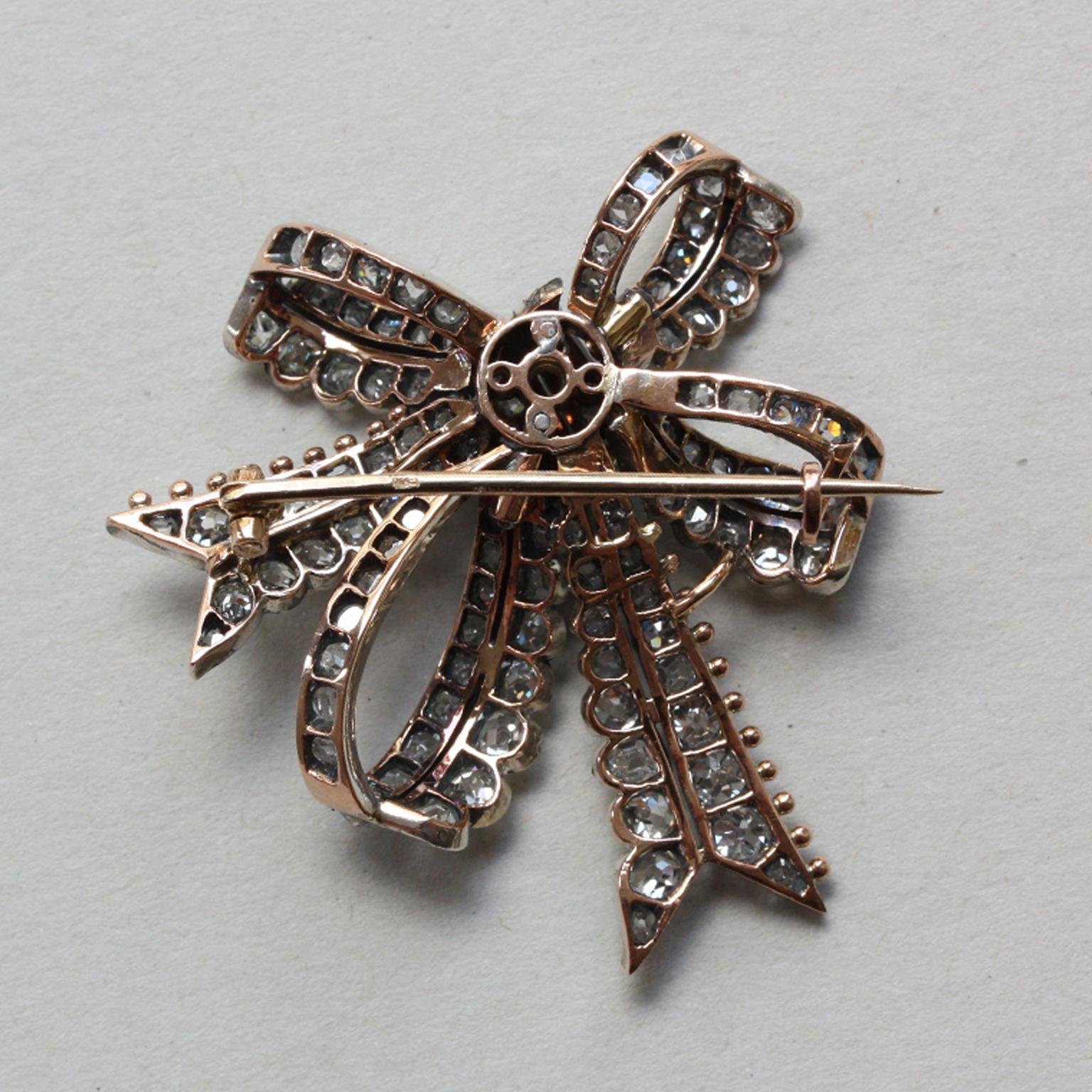 Victorian Silver and Gold and Diamond Bow Brooch, circa 1880 For Sale