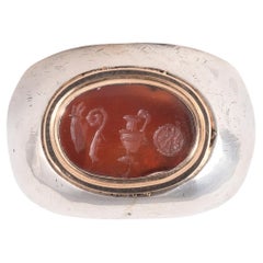 Anillo de plata y oro para hombre con incrustación de cornalina