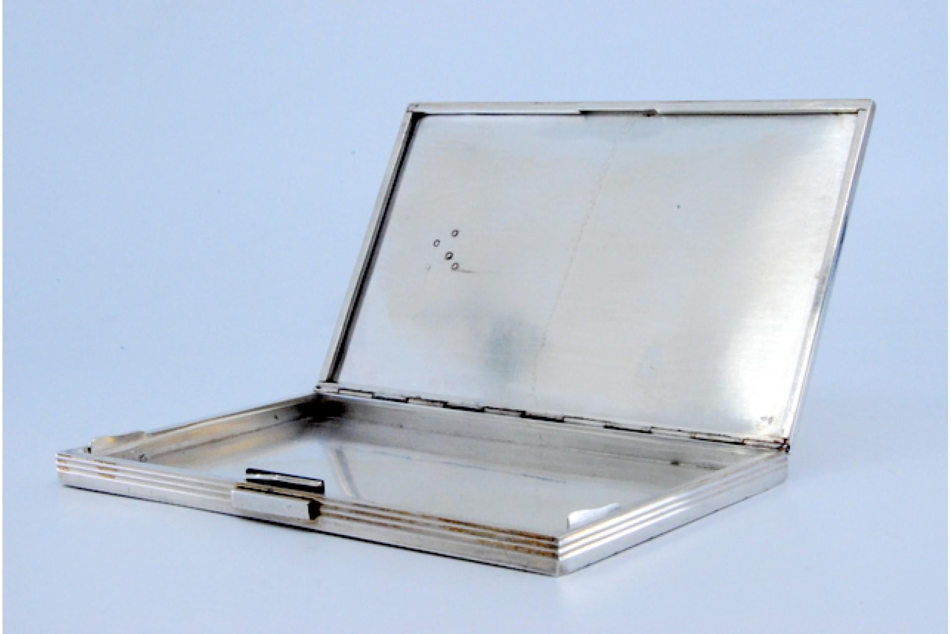 Silver and gold case with raised bands around monogram plate, hinged lid For Sale 2