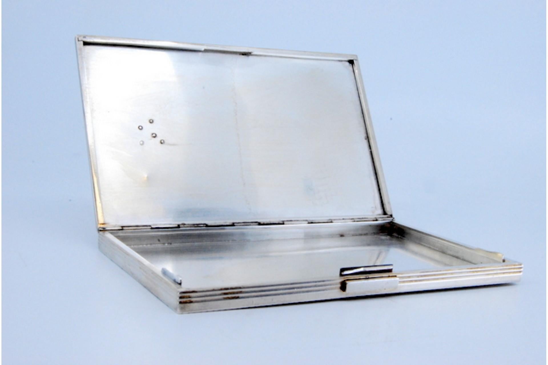 Silver and gold case with raised bands around monogram plate, hinged lid For Sale 3