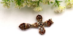Silver and gold cross with diamond chips