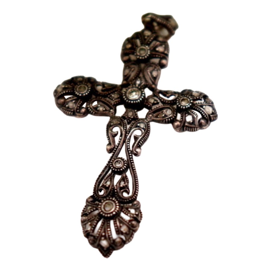 Silver and gold cross with diamond chips
