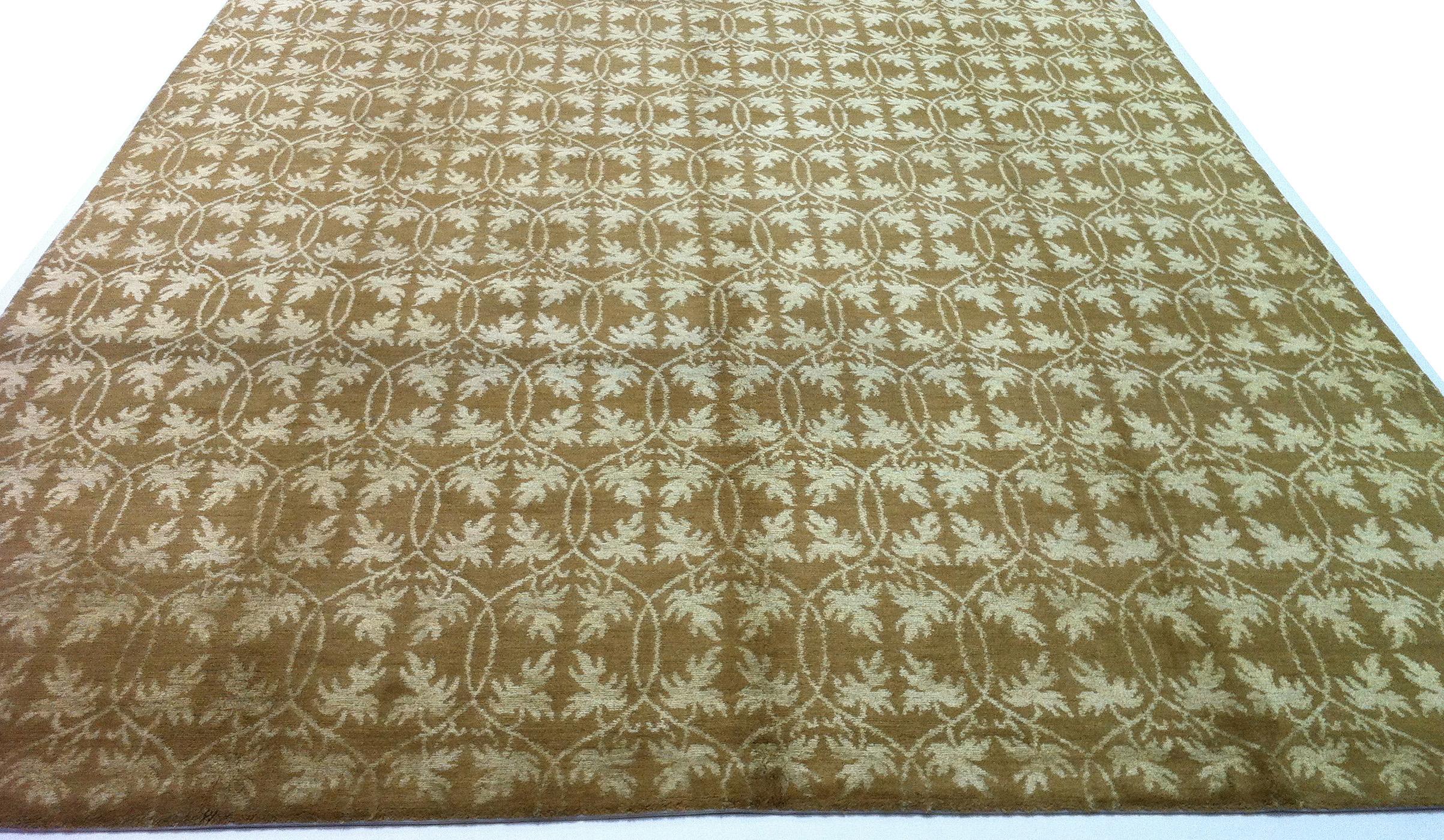 Create an elegant platform for special furnishings with this gold all-over pattern floral area rug. Hand-knotting creates 'light' and 'dark' sides (seen here) when viewed from opposite angles. All wool construction creates comfort and durability.