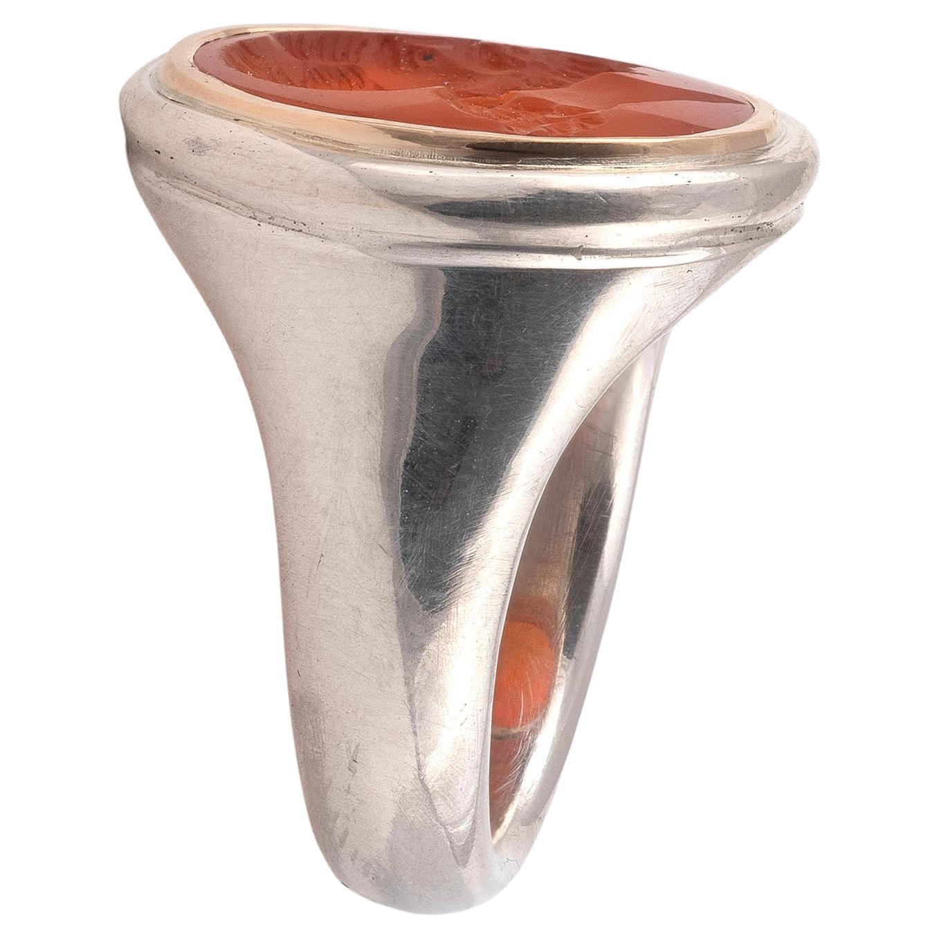 Uncut Silver and Gold Ring Set with a Carnelian Intaglio of a Roman Bust