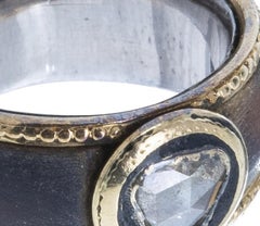 Silver and Gold ring with diamond.