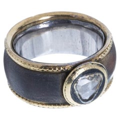 Silver and Gold ring with diamond.