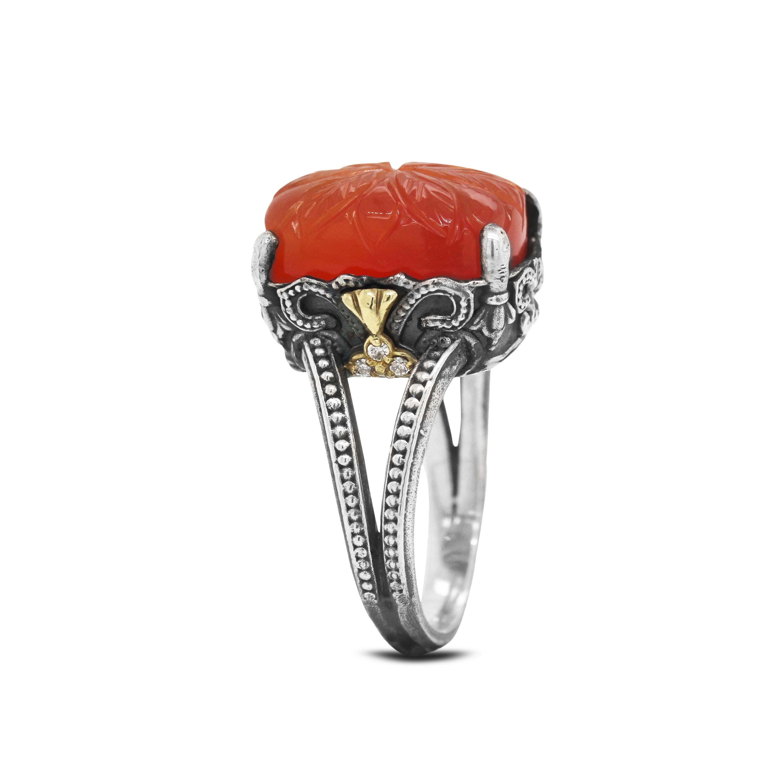 Aged Silver and 18K Gold Ring with Diamonds and Floral Carved Carnelian center by Stambolian

This unique ring is from the 
