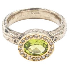 Silver and Gold Ring with Diamonds and Peridot