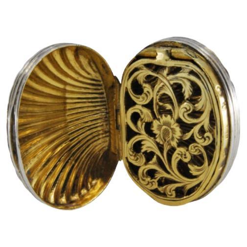 Silver and gold shell-shaped vinaigrette box from the George III period