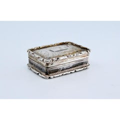 Silver and gold vinaigrette box with George IV period trim on the lid and casing