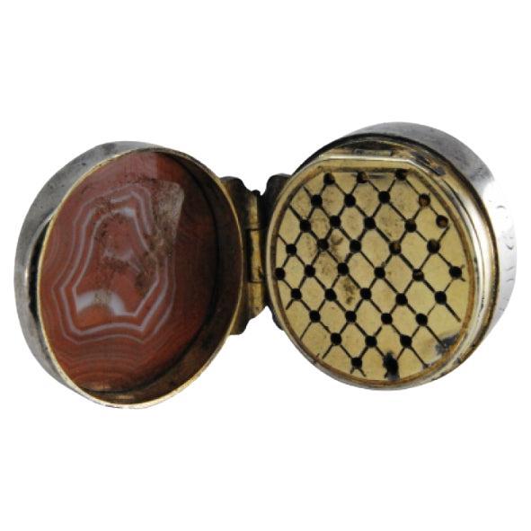 Silver and gold vinaigrette box with hard stone on the lid