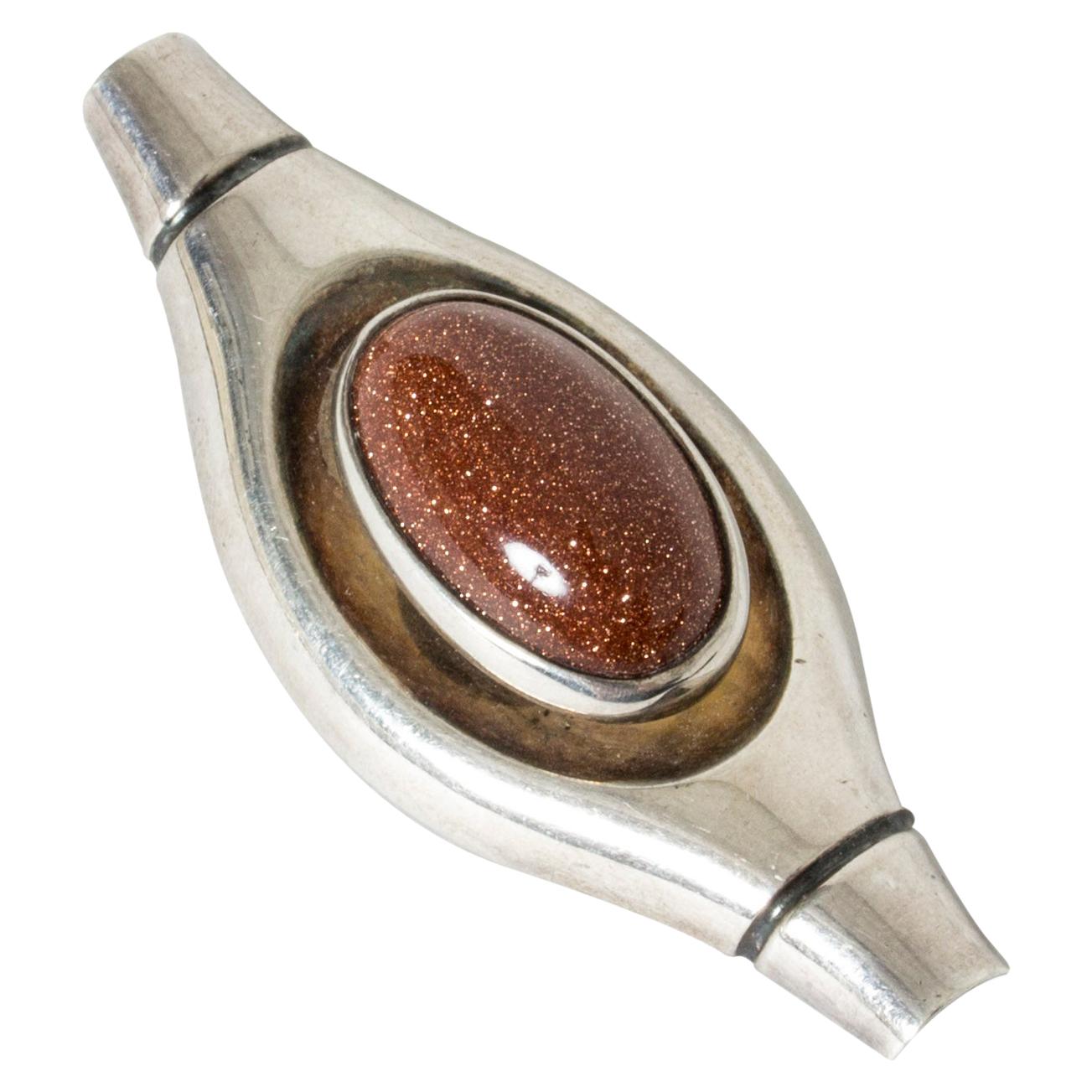 Silver and Goldstone Brooch by Elis Kauppi for Kupittaan Kulta, Finland, 1960s For Sale